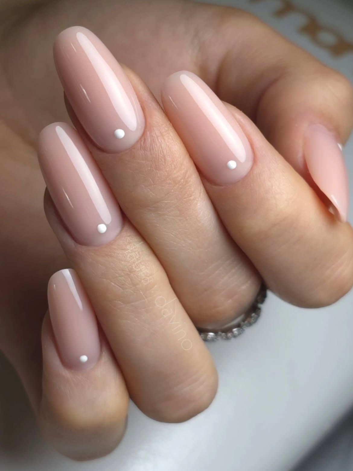 Subtle Dot Nude Almond Nails