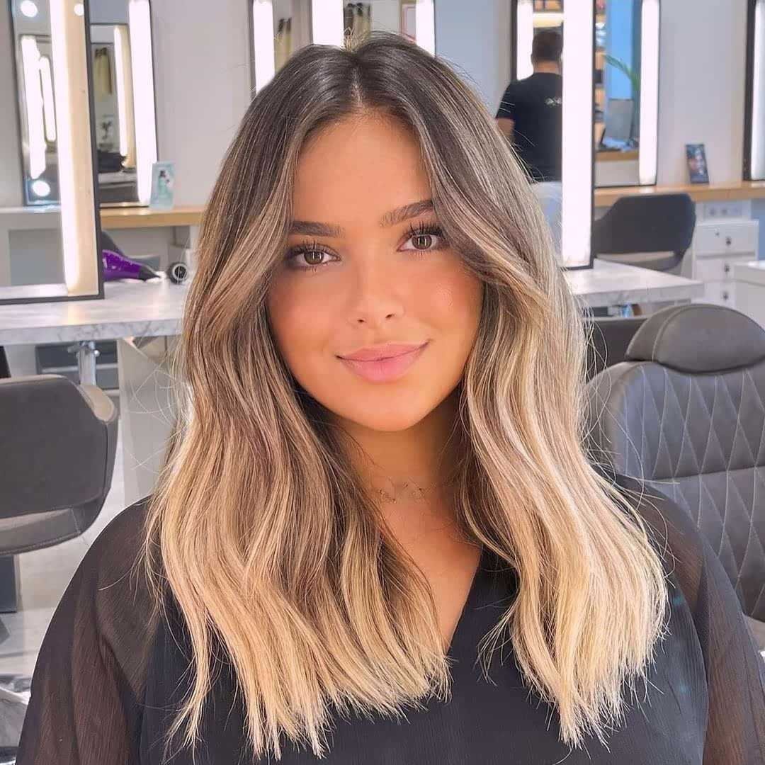 Sun-Kissed Honey Blonde Balayage With Soft Waves