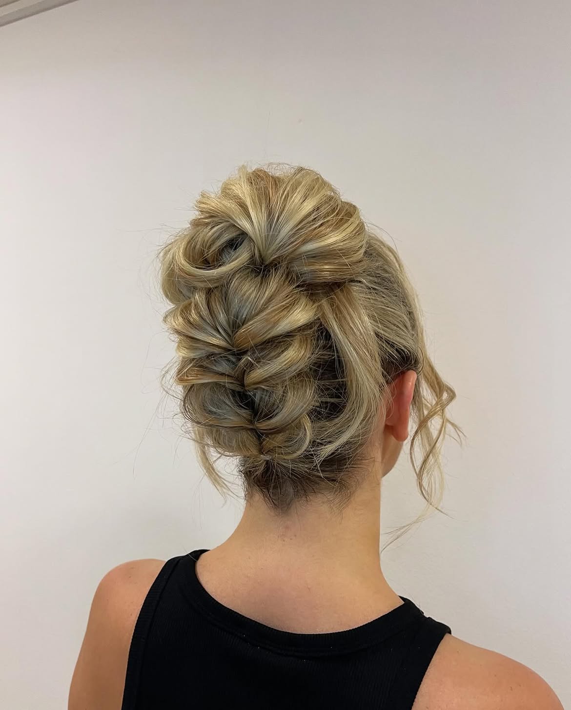 Textured Braided Updo For A Chic Thanksgiving Look