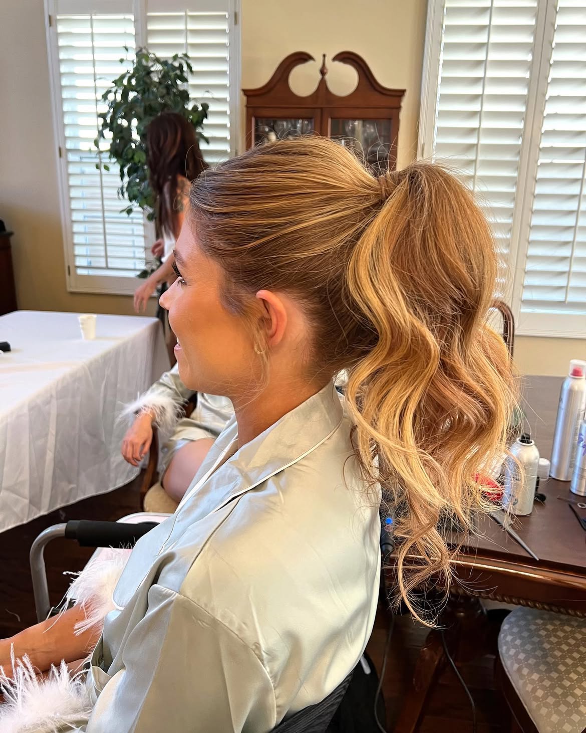Textured High Ponytail With Loose Curls