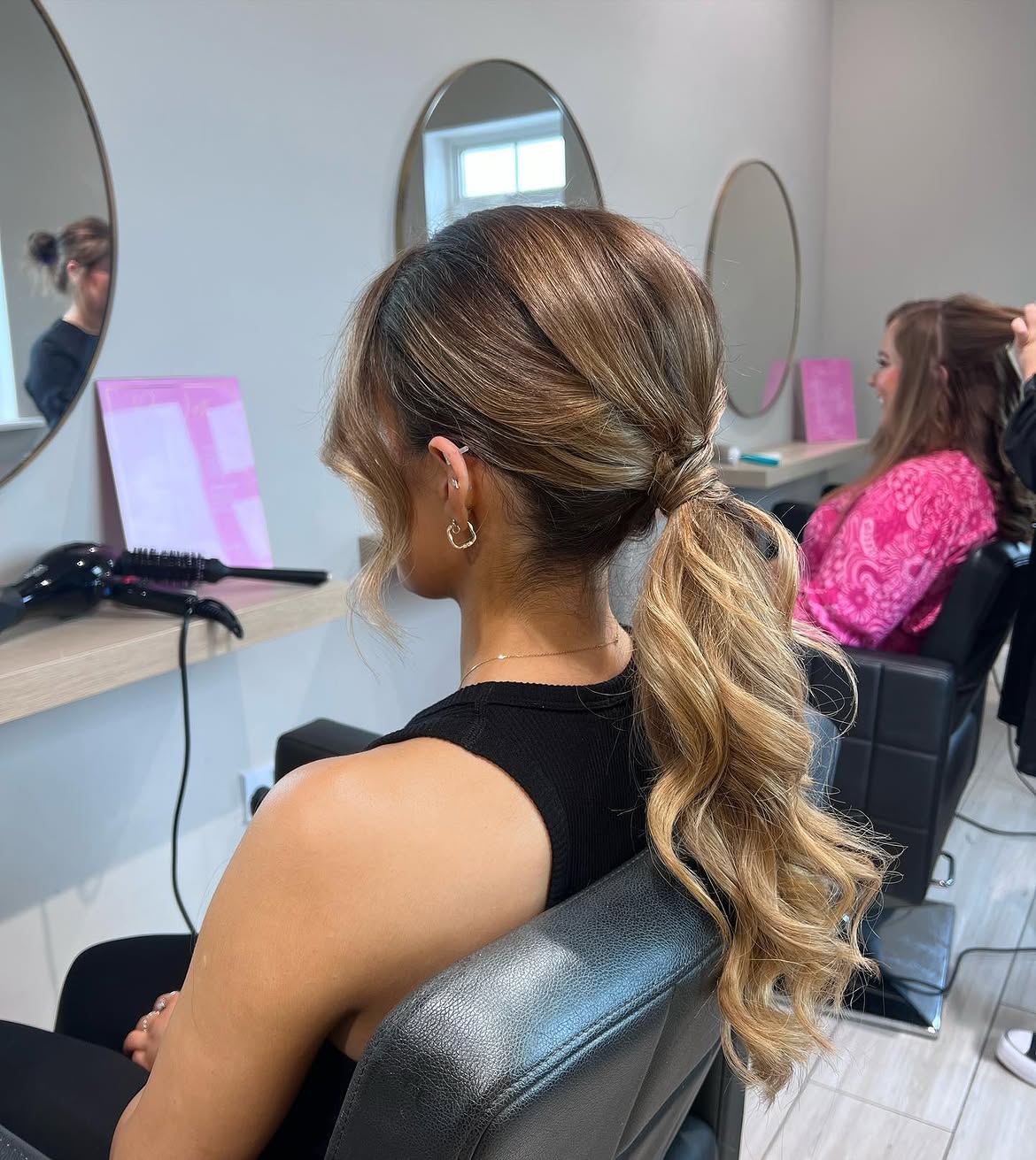 Textured High Ponytail With Loose Waves