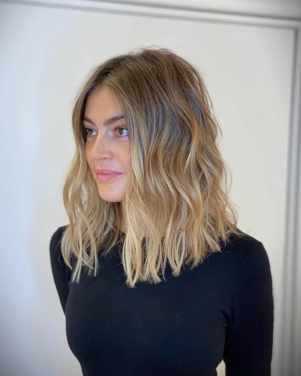Textured Honey Blonde Balayage Lob With Beachy Waves