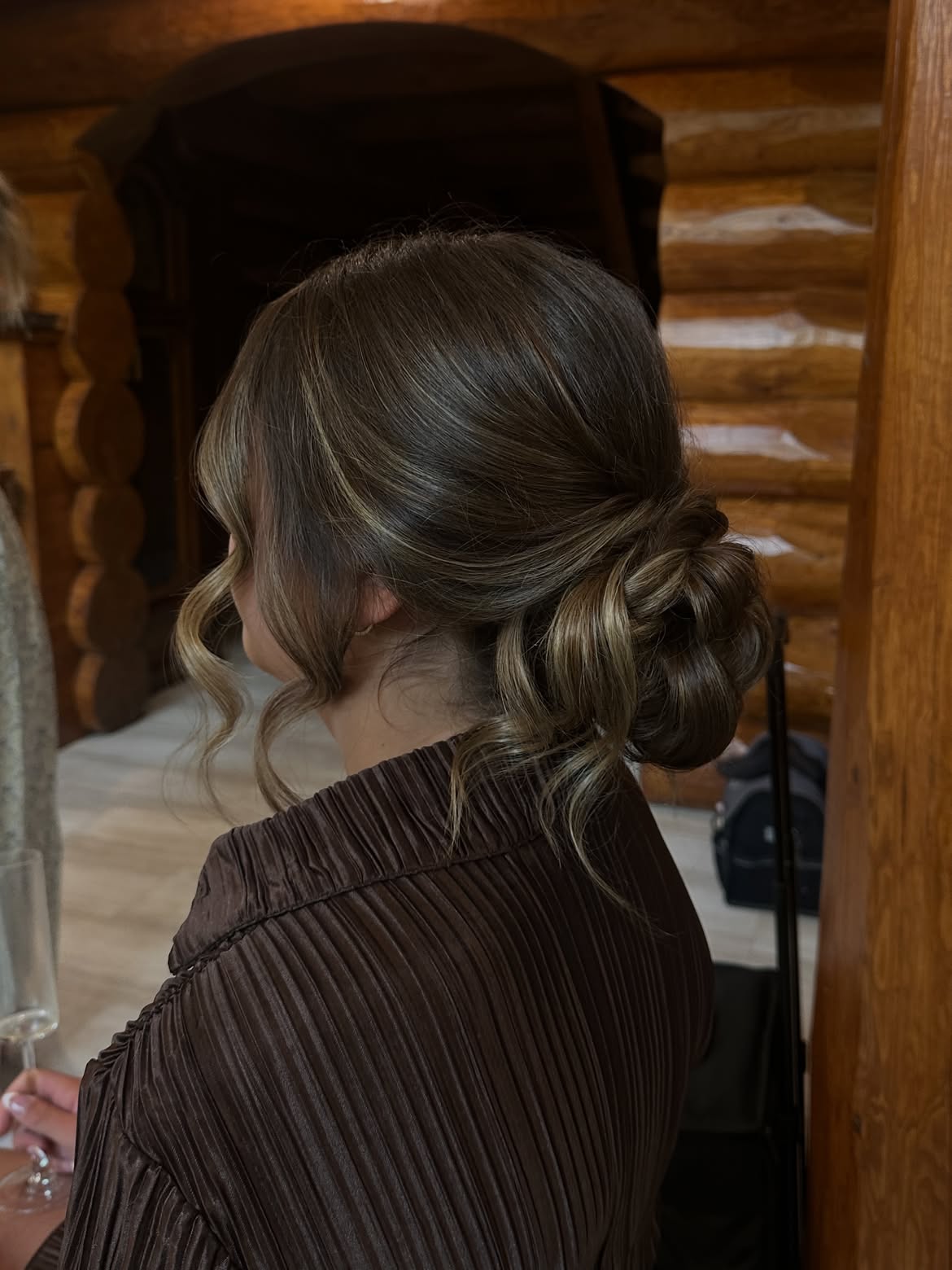 Textured Low Bun With Soft Face Framing Pieces