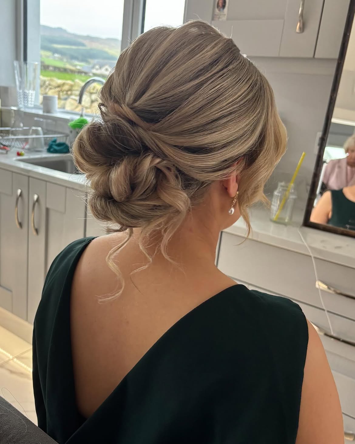 Textured Low Chignon With Face Framing Strands