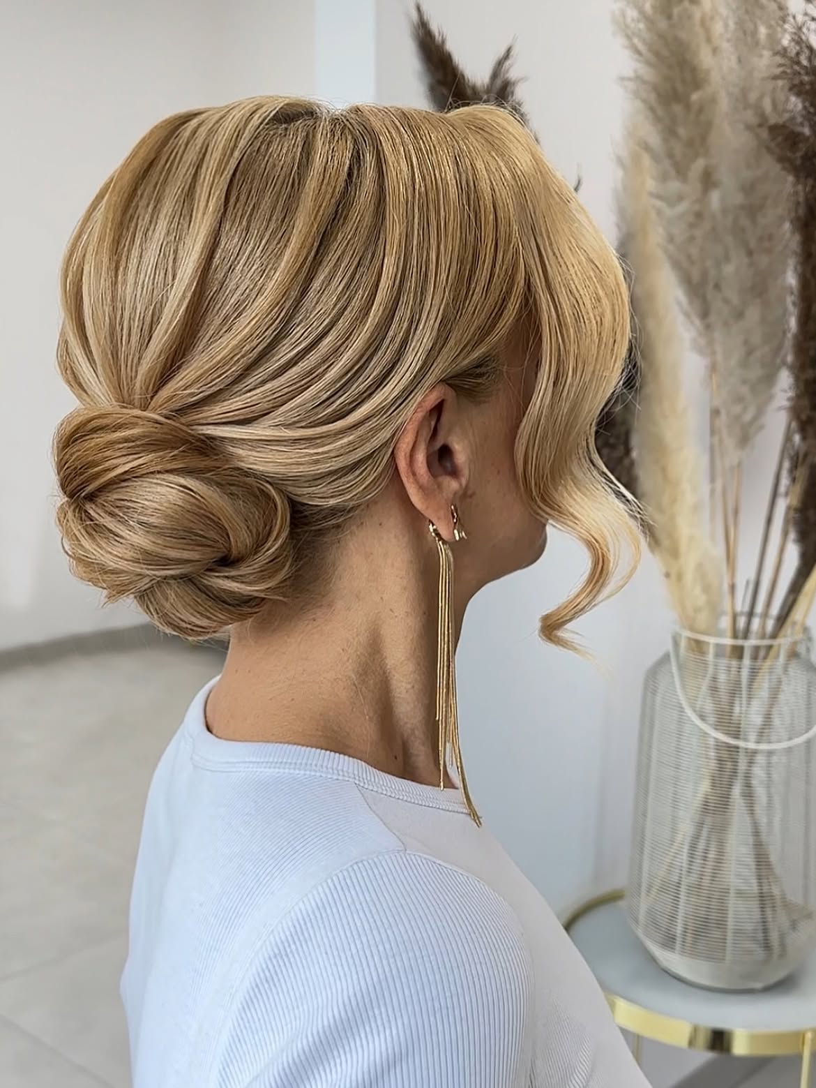 Textured Low Chignon With Face Framing Waves