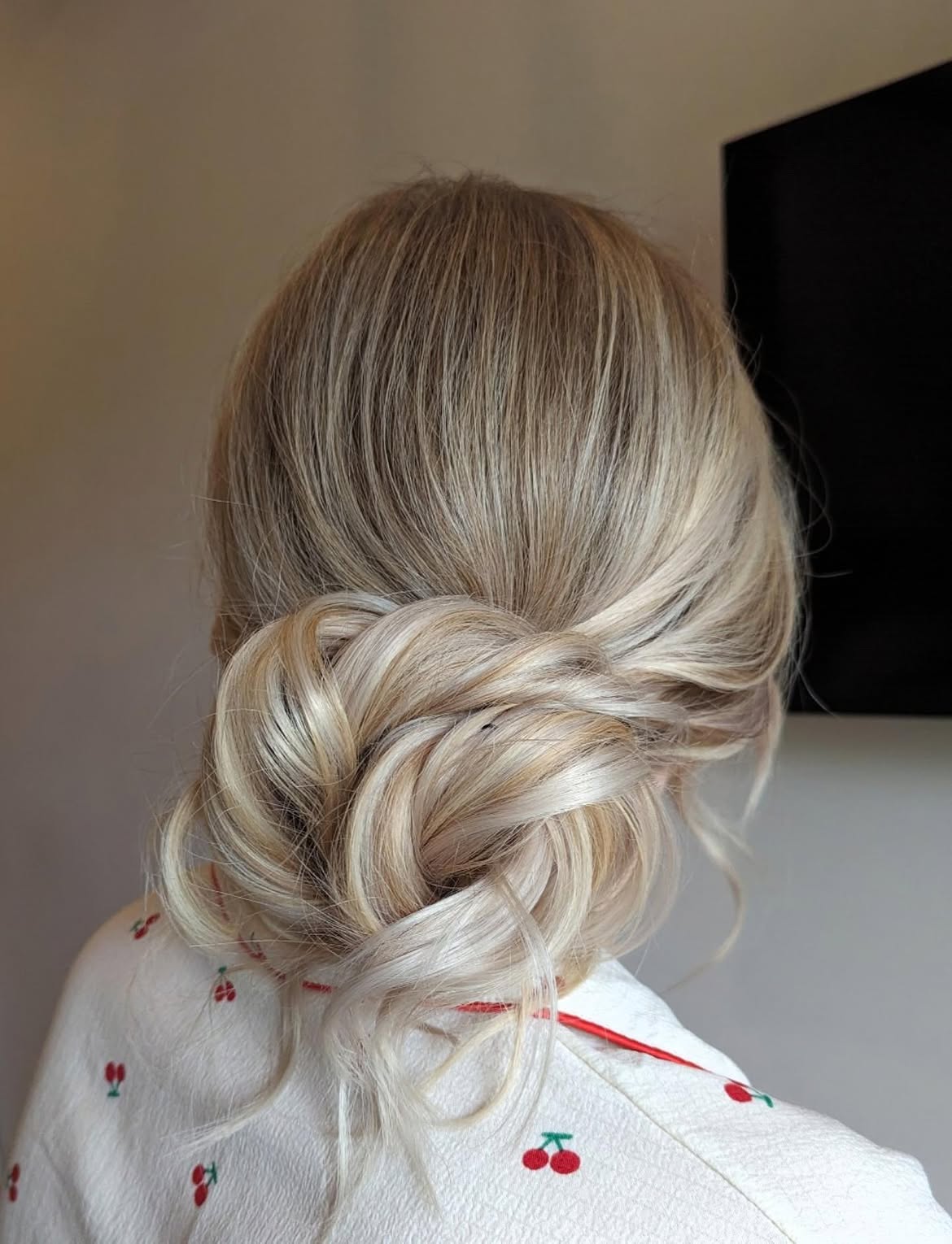 Textured Low Messy Bun For Blonde Hair