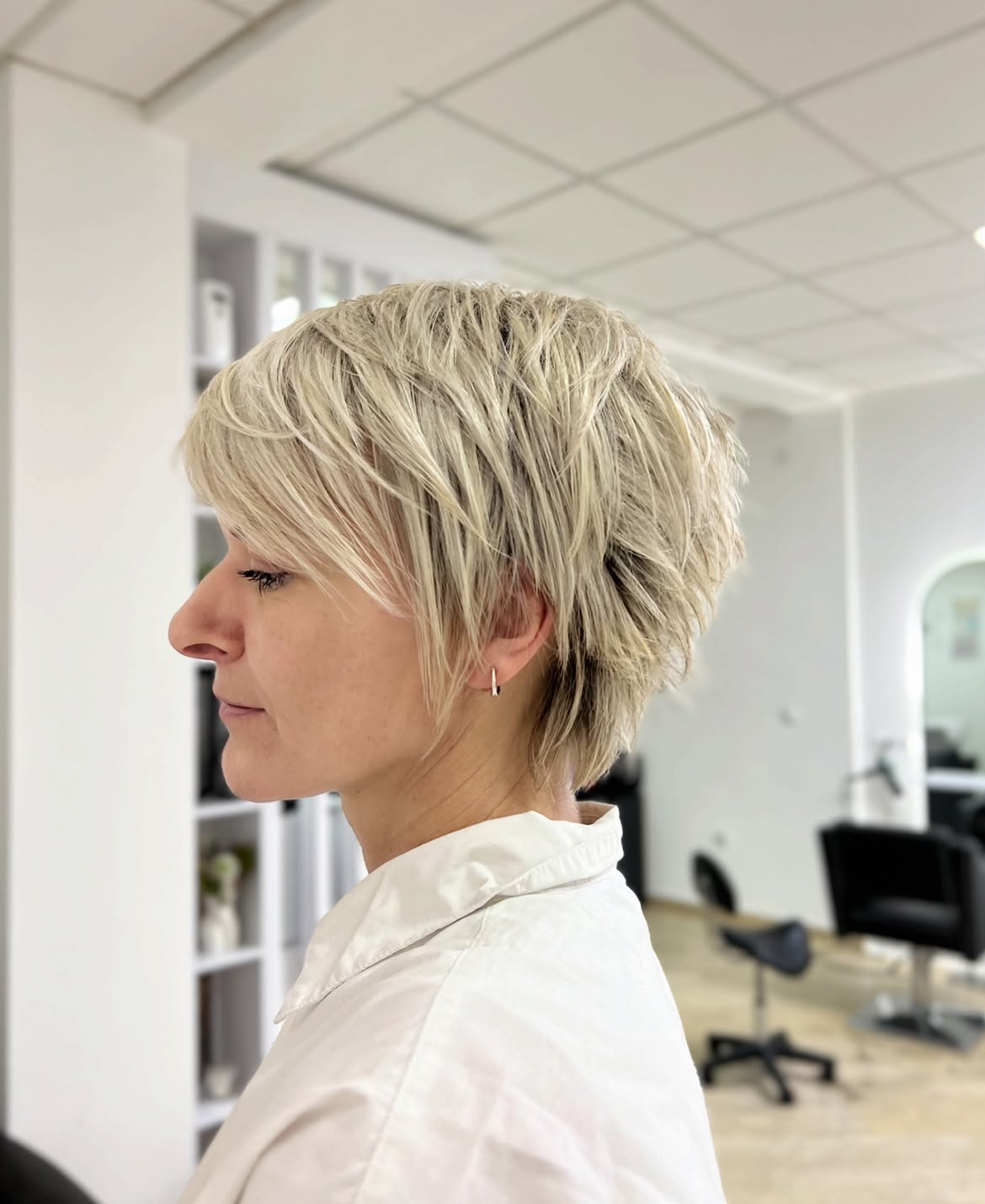 Textured Platinum Blonde Layered Pixie Bob