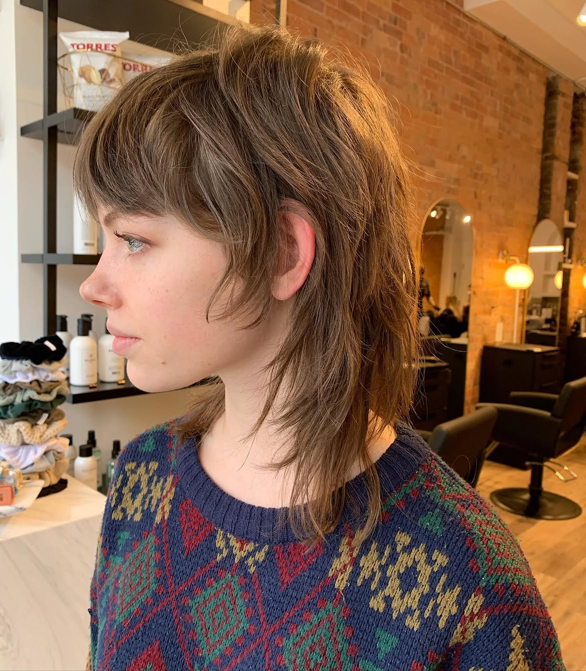 Textured Shag With Wispy Bangs On Brunette Hair
