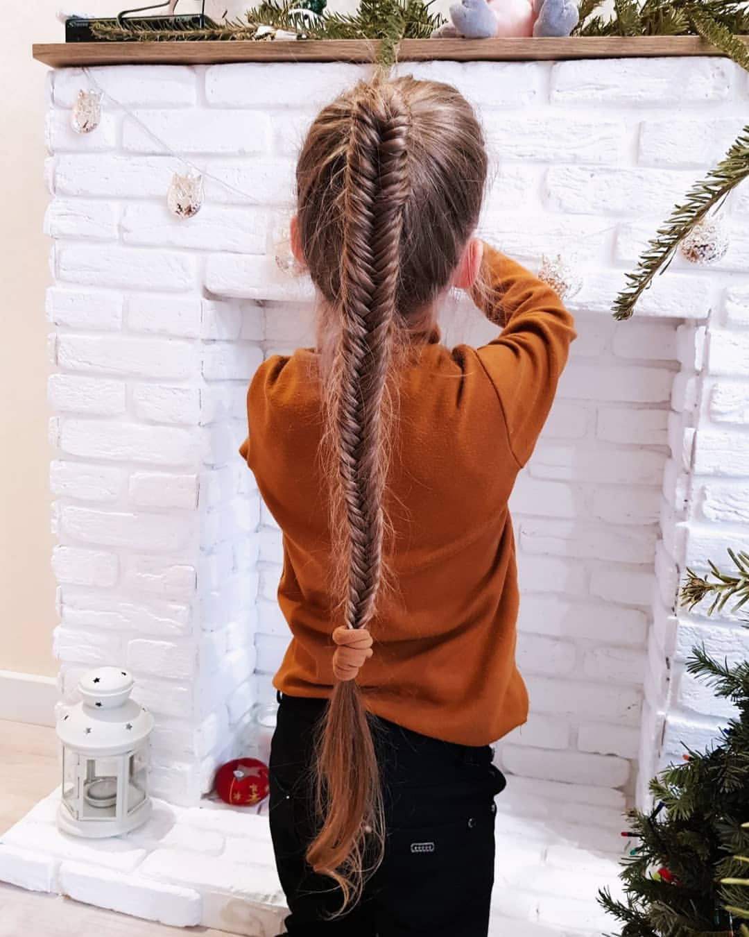 Tight Fishtail Braid On Long Natural Hair