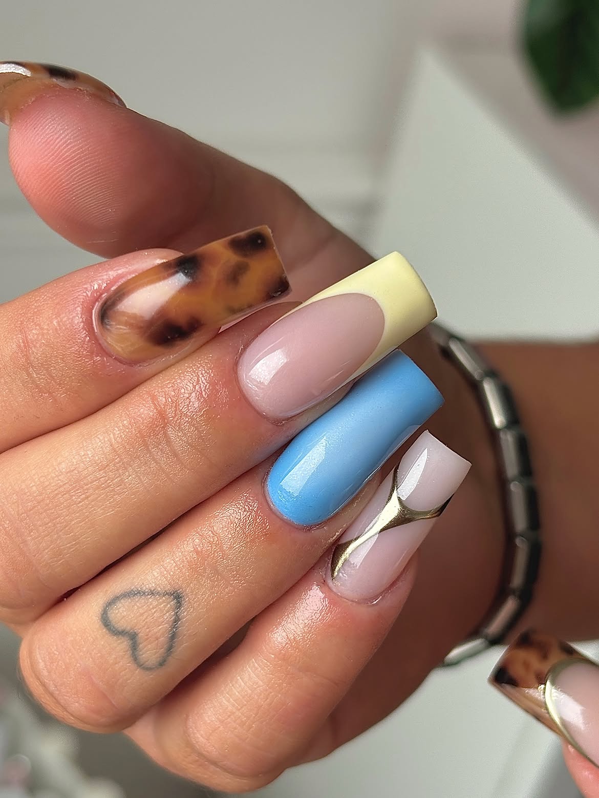 Tortoiseshell and Pastel French Tip Nails