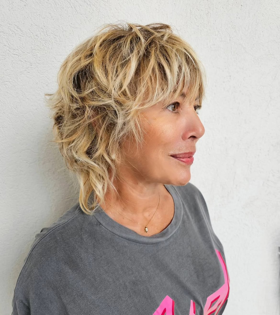 Tousled Blonde Shag With Wispy Face Framing Layers