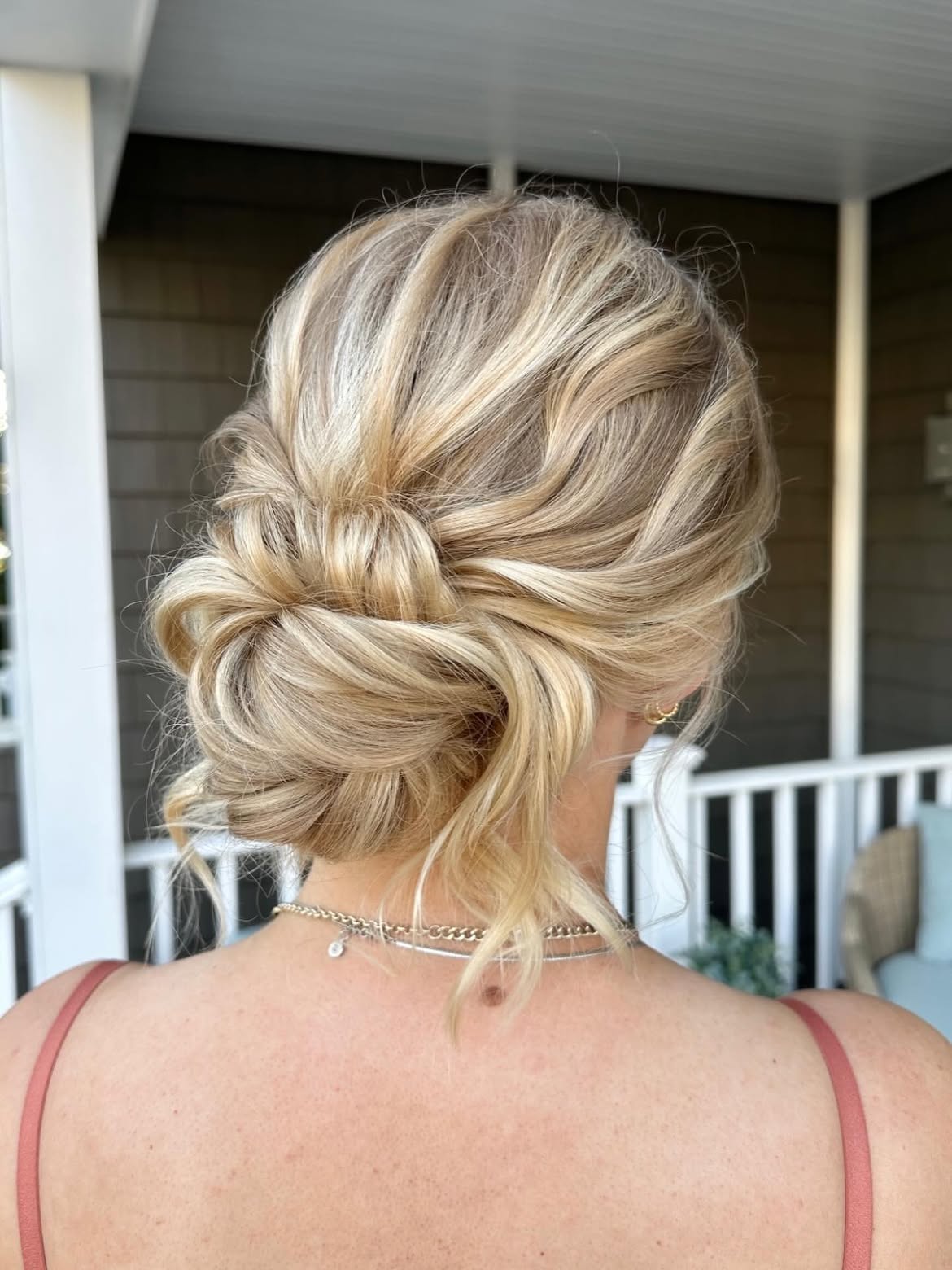 Tousled Low Chignon With Loose Face-Framing Strands