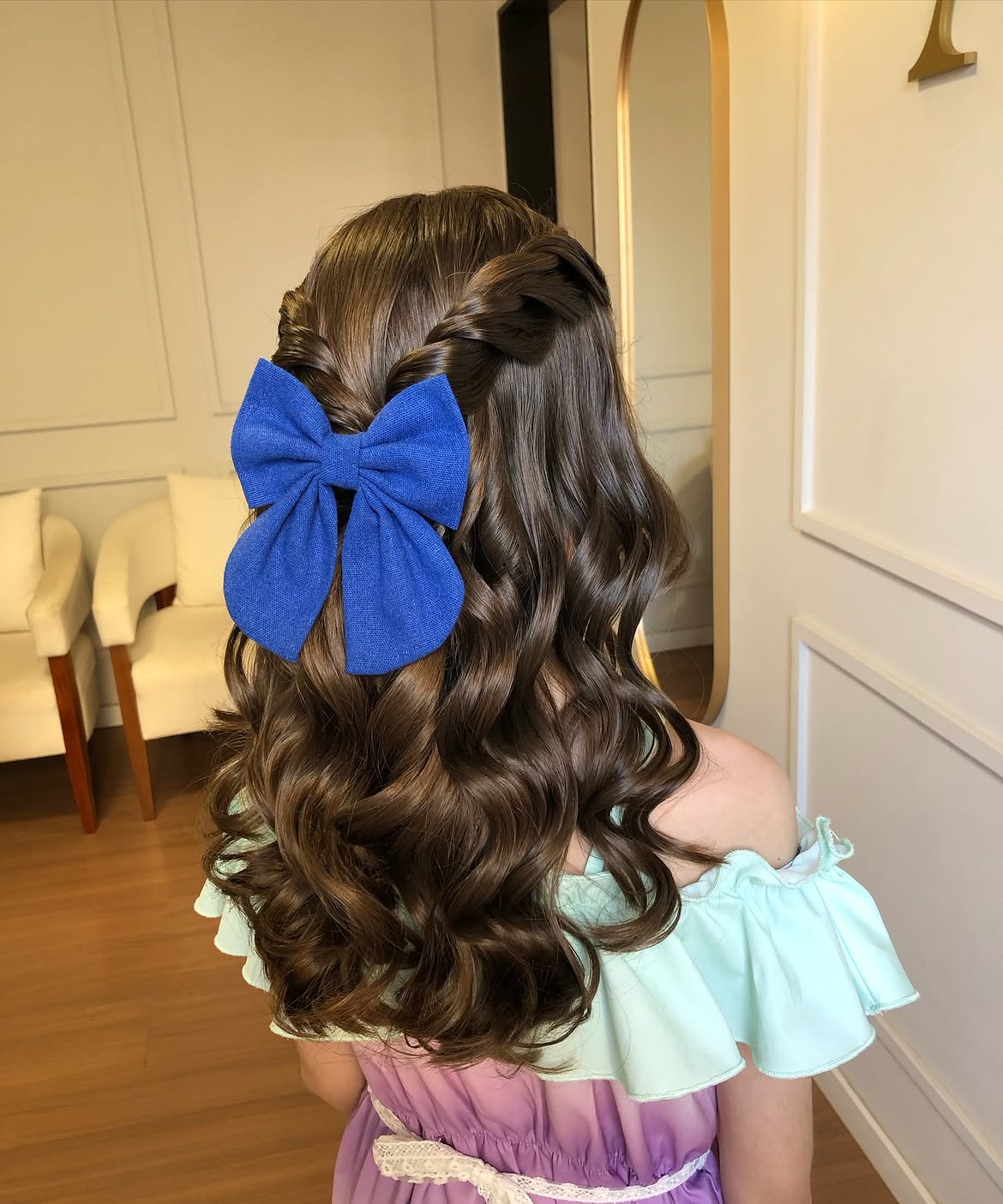 Twisted Crown Braids With Big Blue Bow