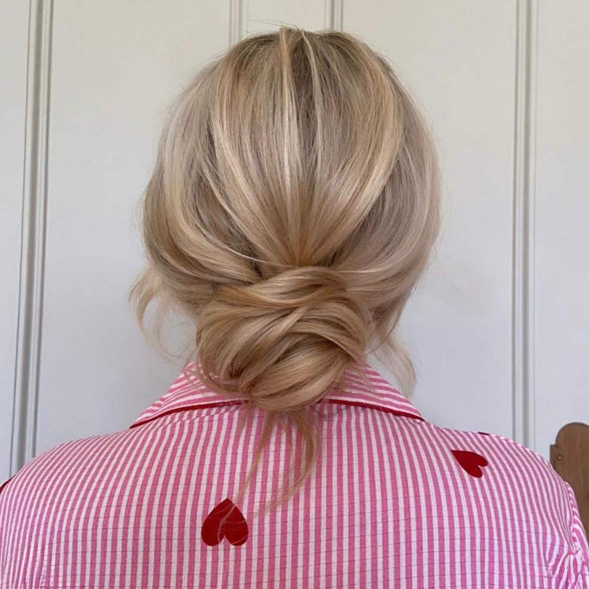 Twisted Low Bun With Face-Framing Strands