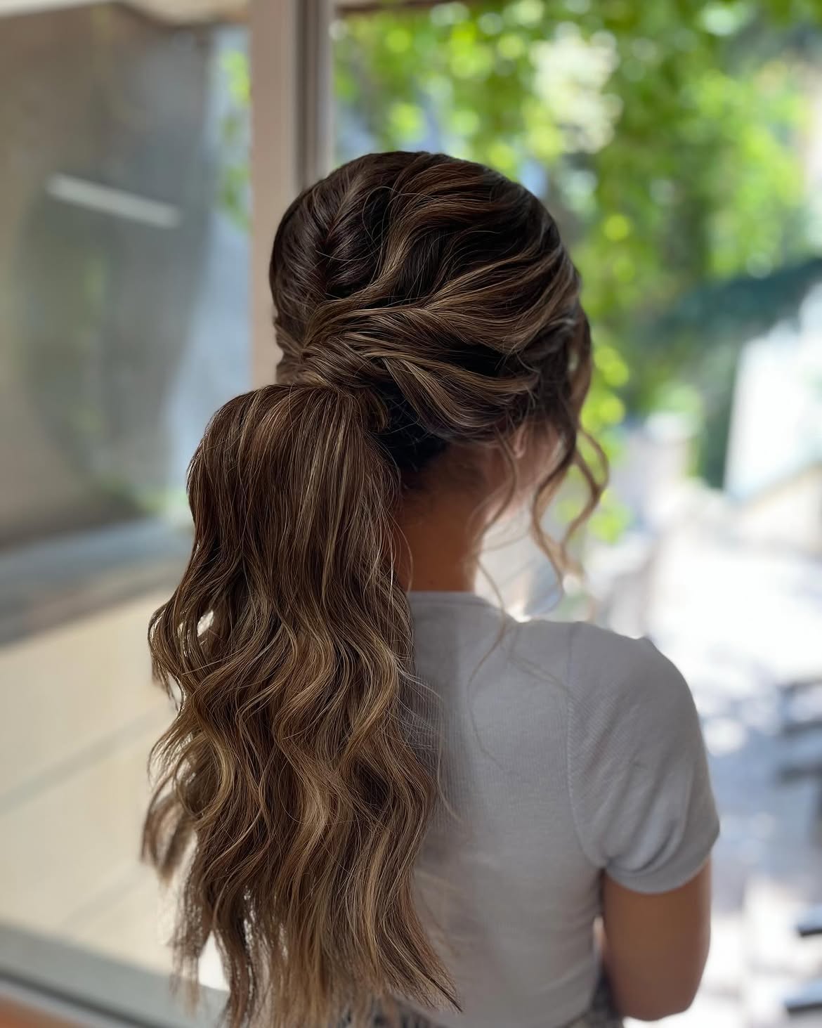 Twisted Low Ponytail With Loose Waves