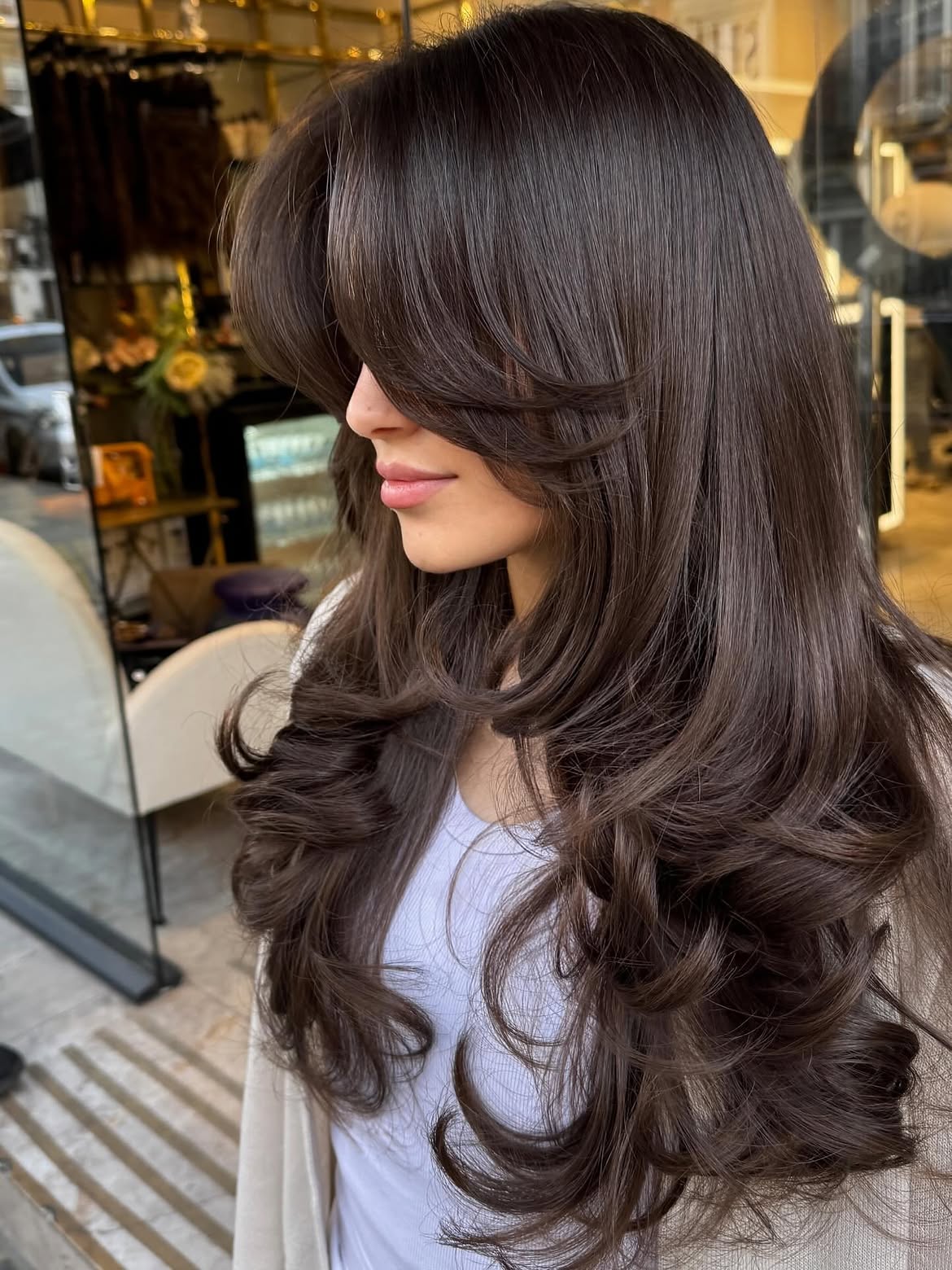 Voluminous Brunette Layers With Soft Curtain Bangs