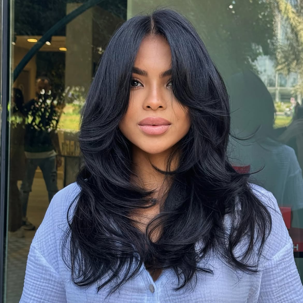 Voluminous Butterfly Layers With Soft Curtain Bangs