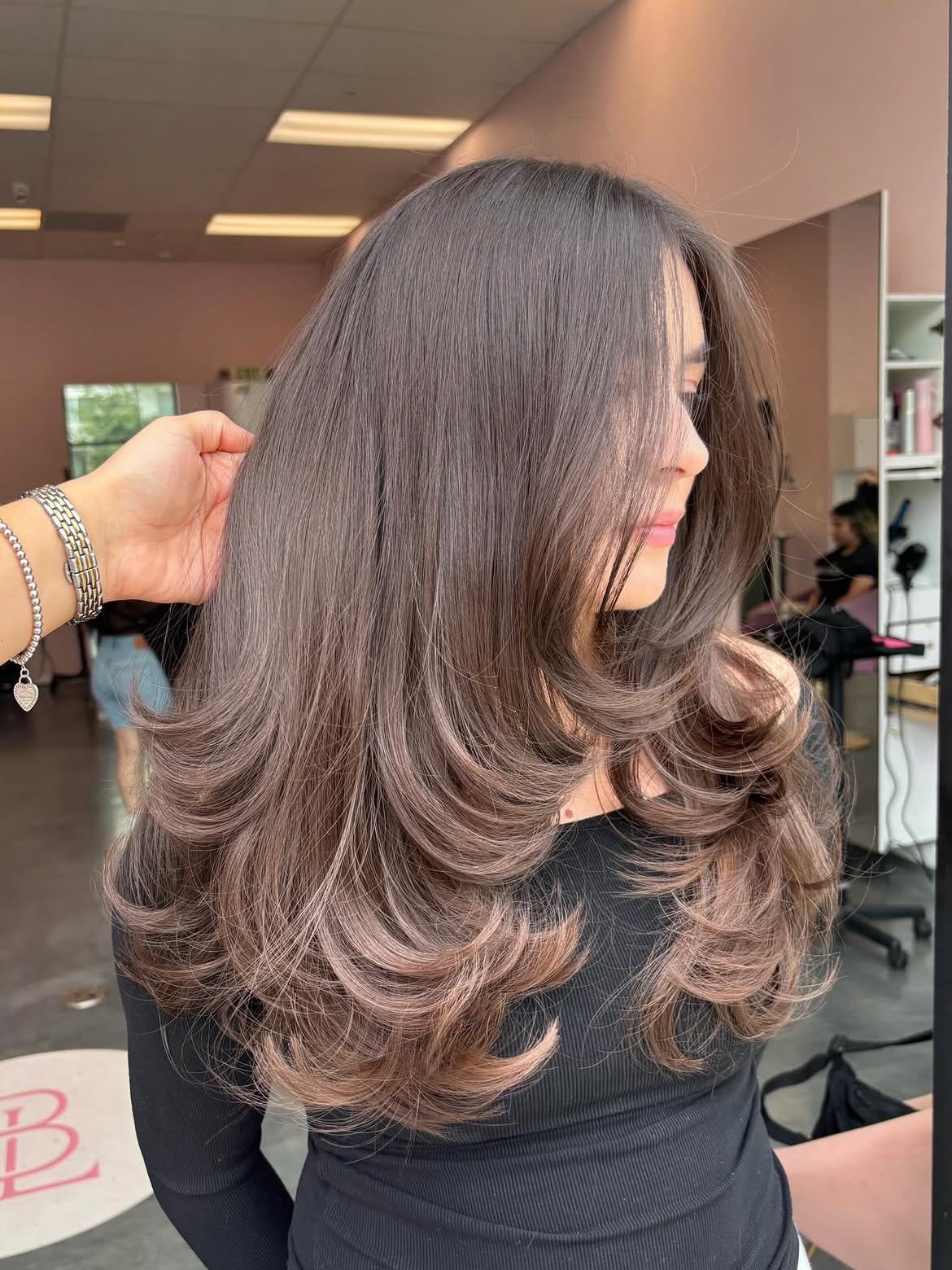 Voluminous Butterfly Layers With Soft Face Framing