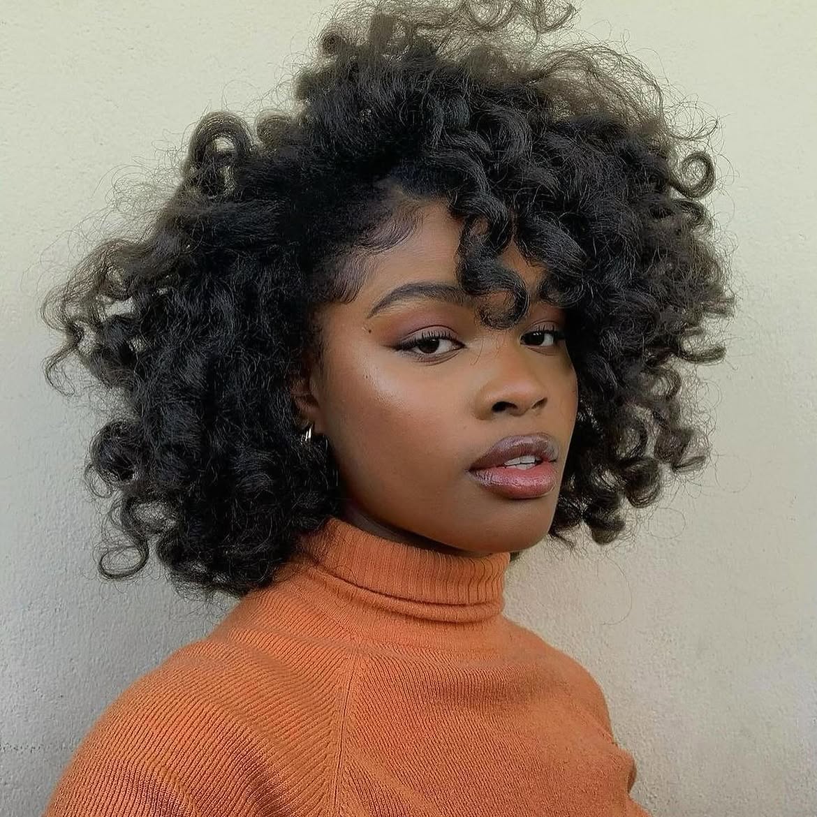 Voluminous Curly Bob With Defined Edge Control