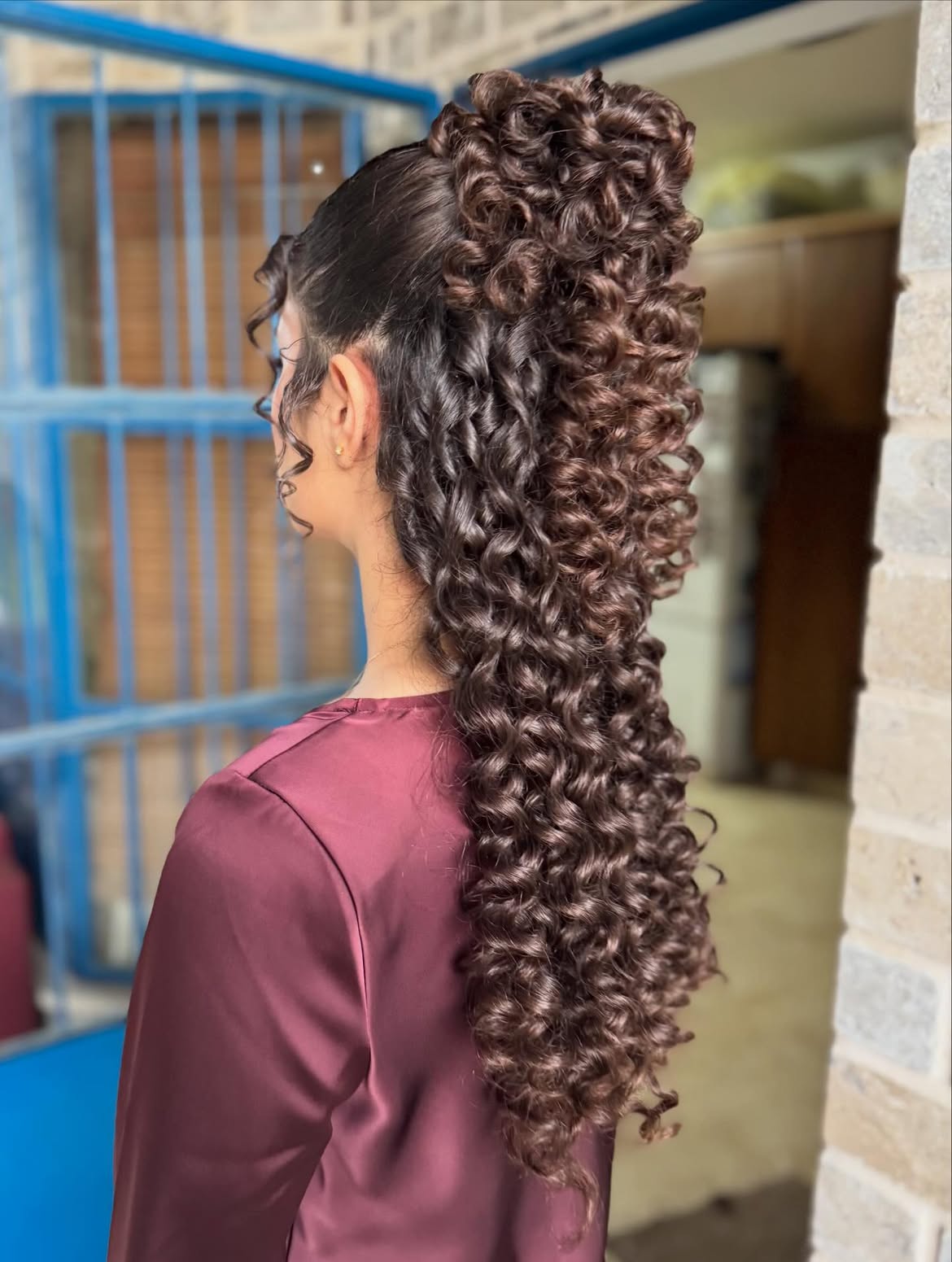 Voluminous Curly High Ponytail For Long Hair