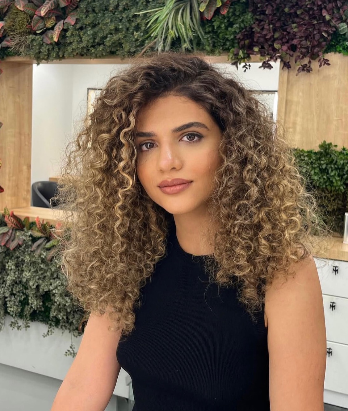 Voluminous Curly Layers With Golden Caramel Balayage