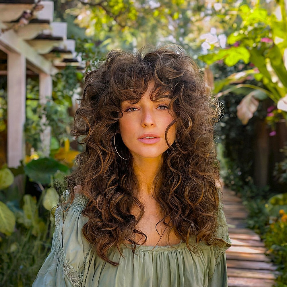 Voluminous Curly Shag With Face Framing Fringe