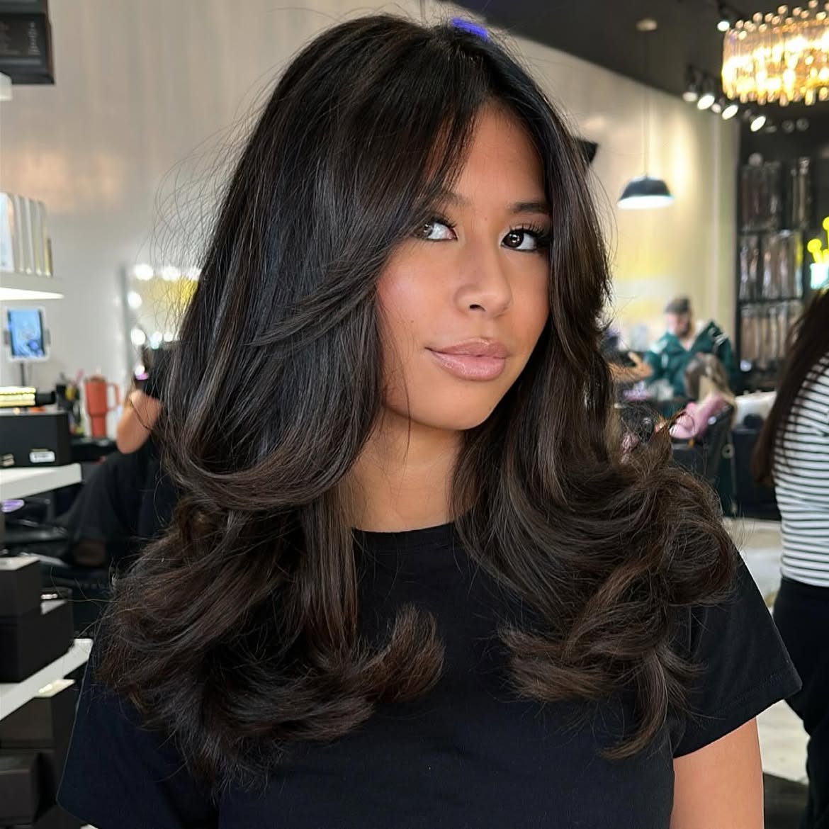 Voluminous Dark Brown Hair With Face-Framing Layers
