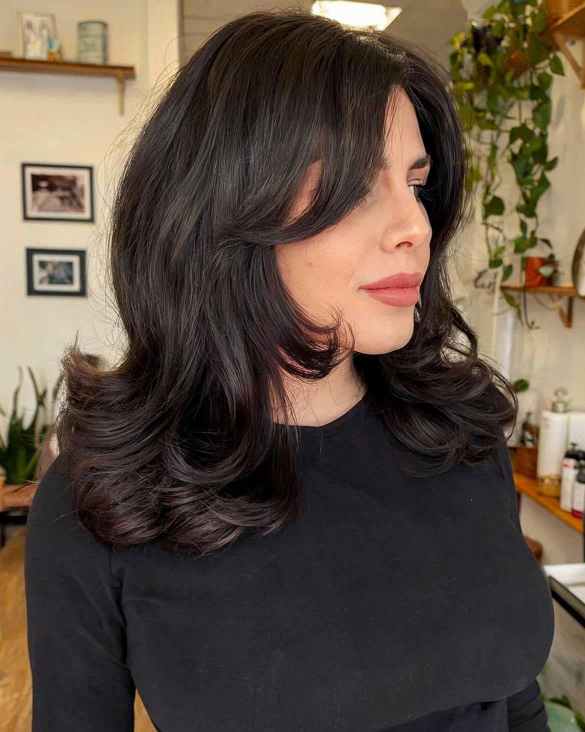 Voluminous Dark Brown Layers With Face-Framing Bangs