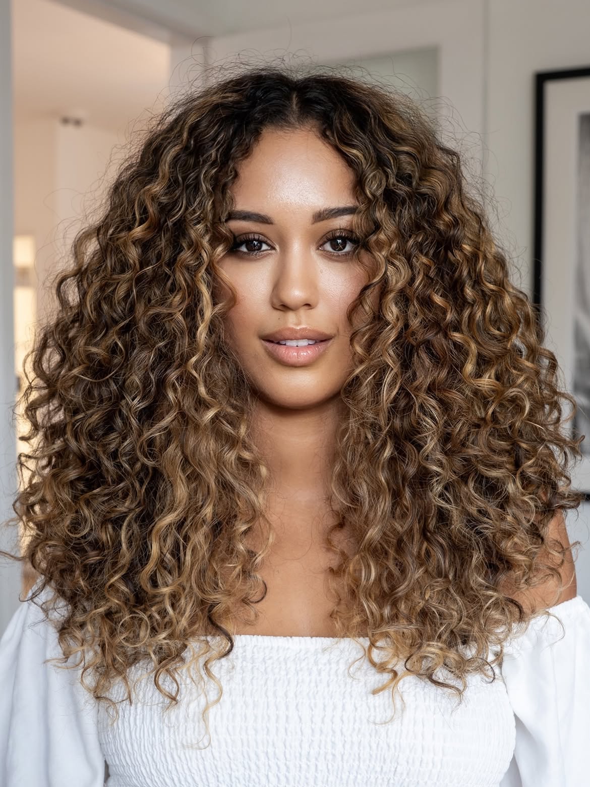 Voluminous Honey Blonde Curly Layers
