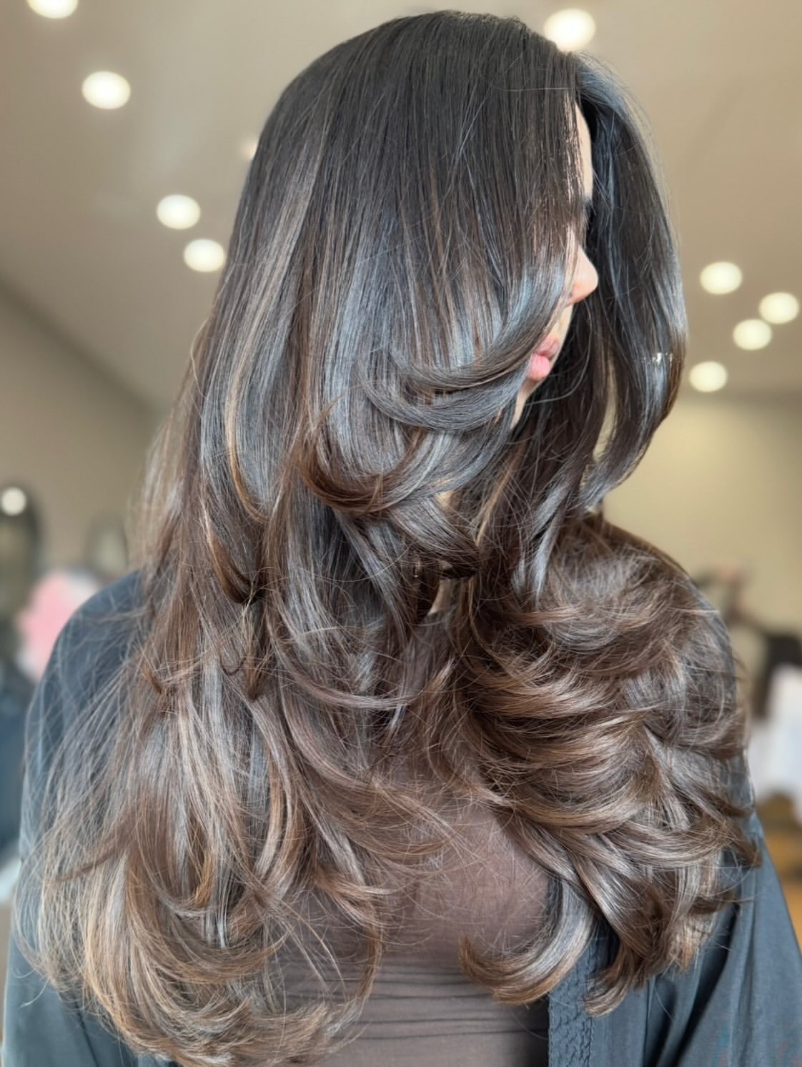 Voluminous Layered Butterfly Cut With Dimensional Brunette Highlights