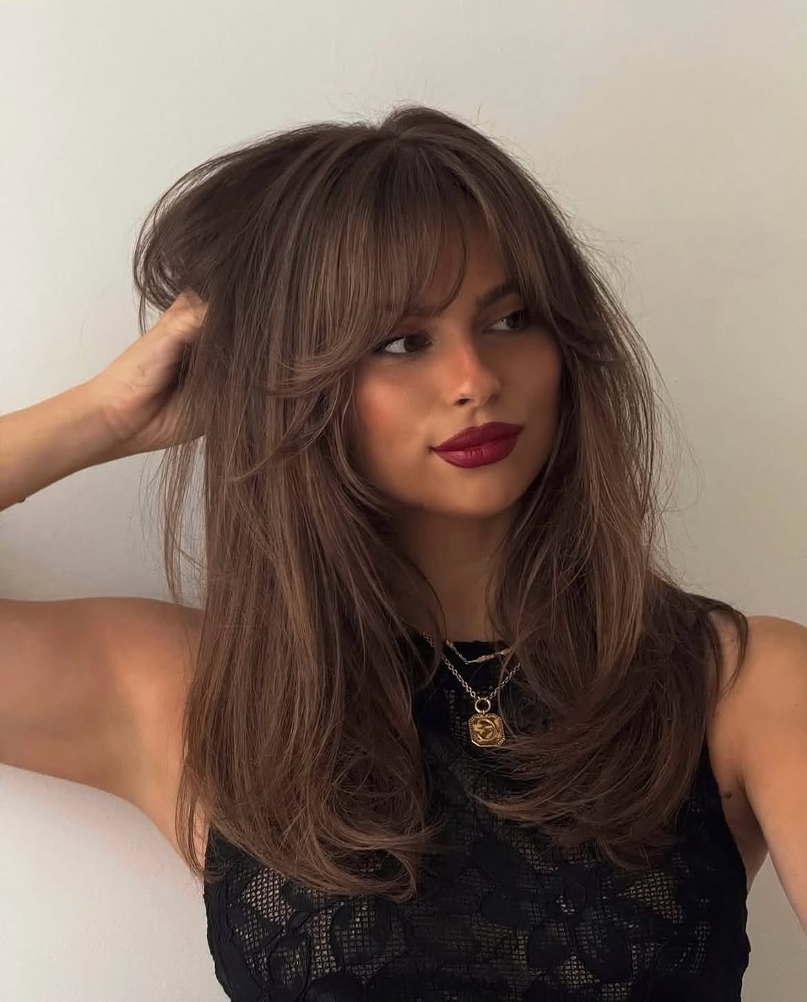 Voluminous Long Layers With Soft Curtain Bangs