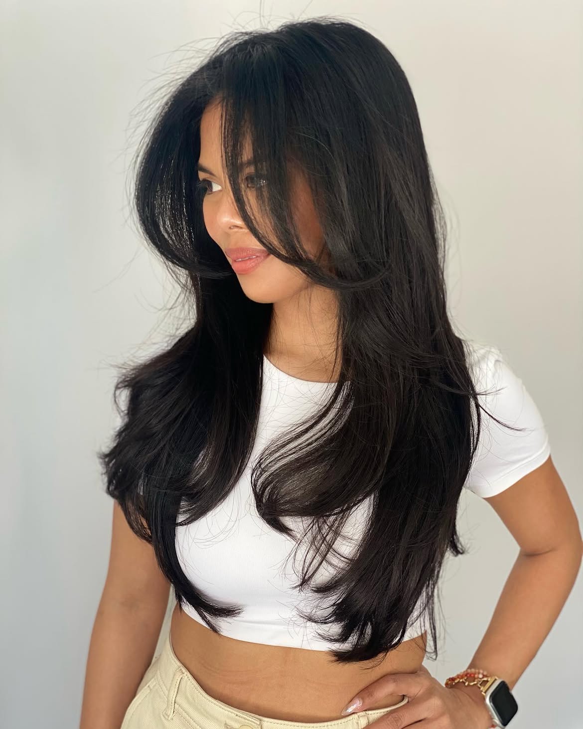 Voluminous Long Layers With Soft Face Framing Curtain Bangs