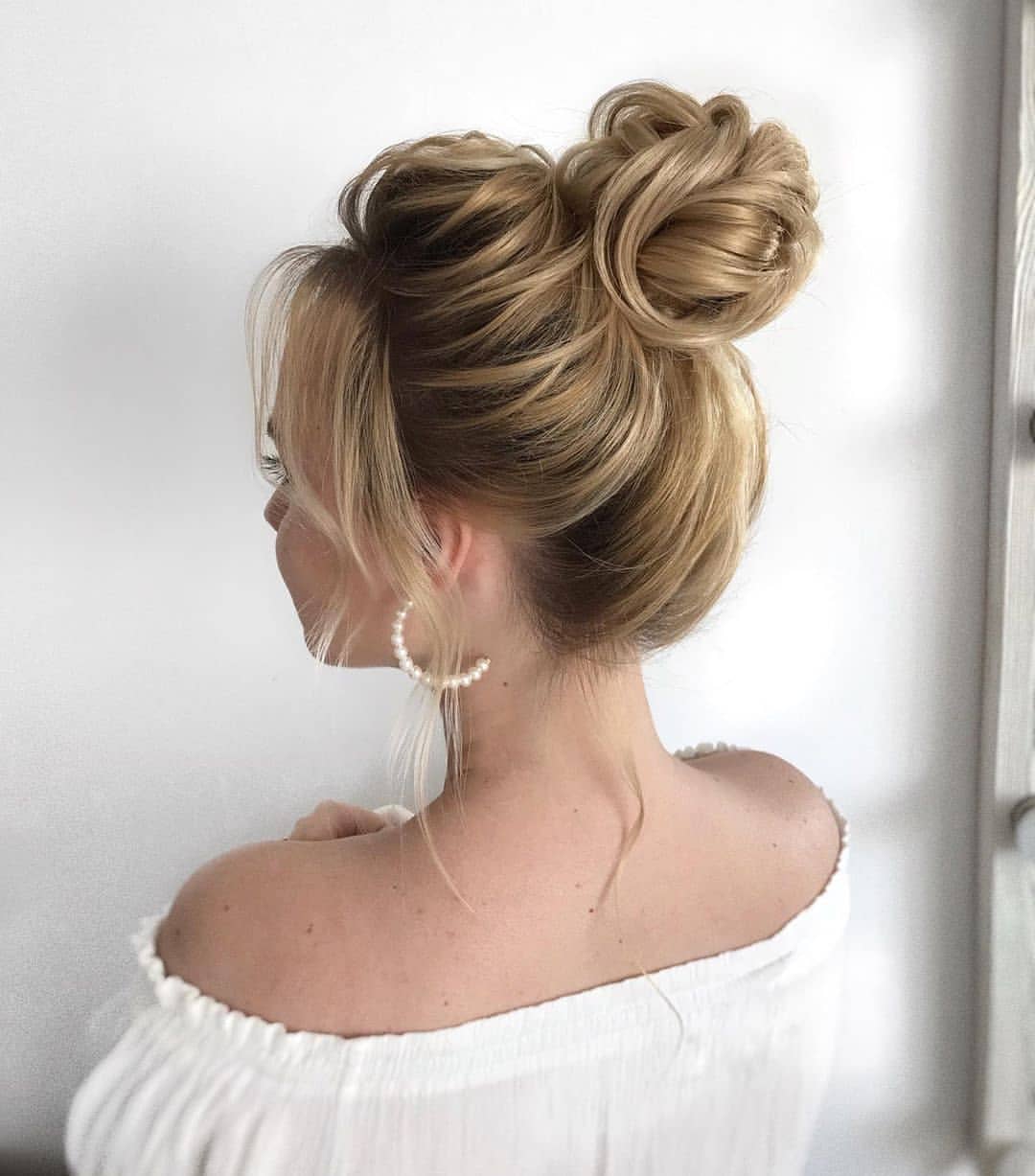 Voluminous Messy Double High Buns