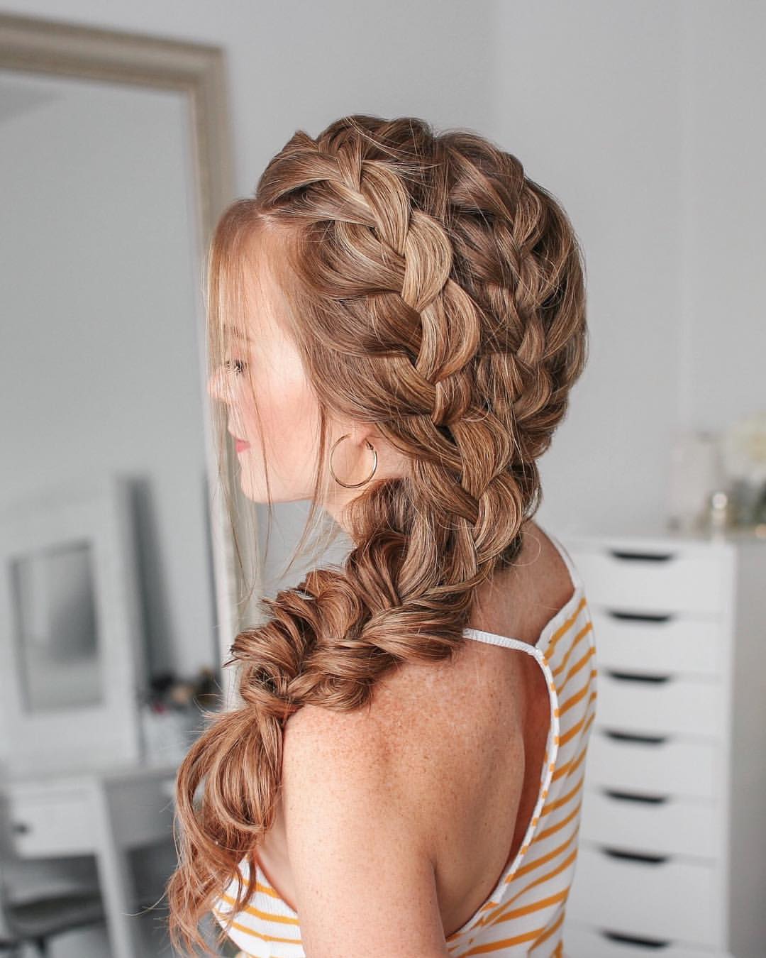 Voluminous Side Swept Dutch Braid With Face Framing Tendrils
