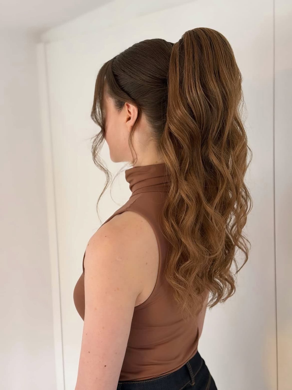 Voluminous Wavy High Ponytail With Face Framing Pieces