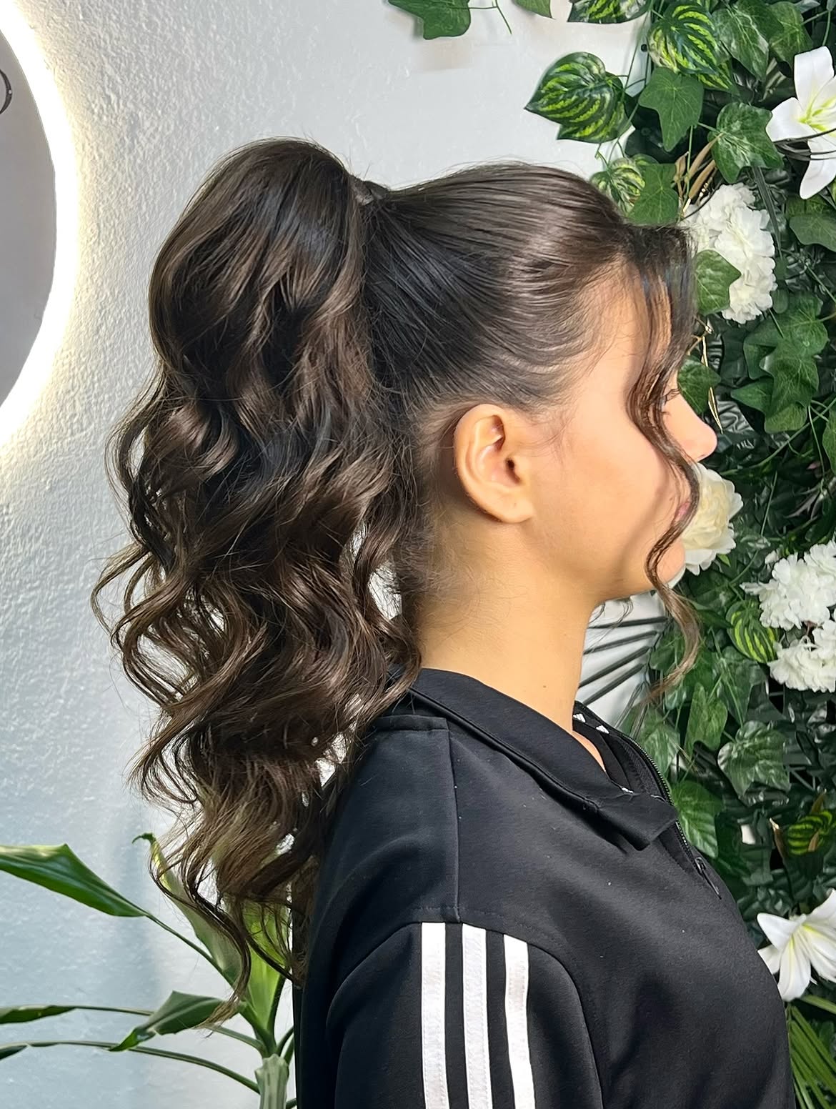 Voluminous Wavy High Ponytail With Face Framing Pieces