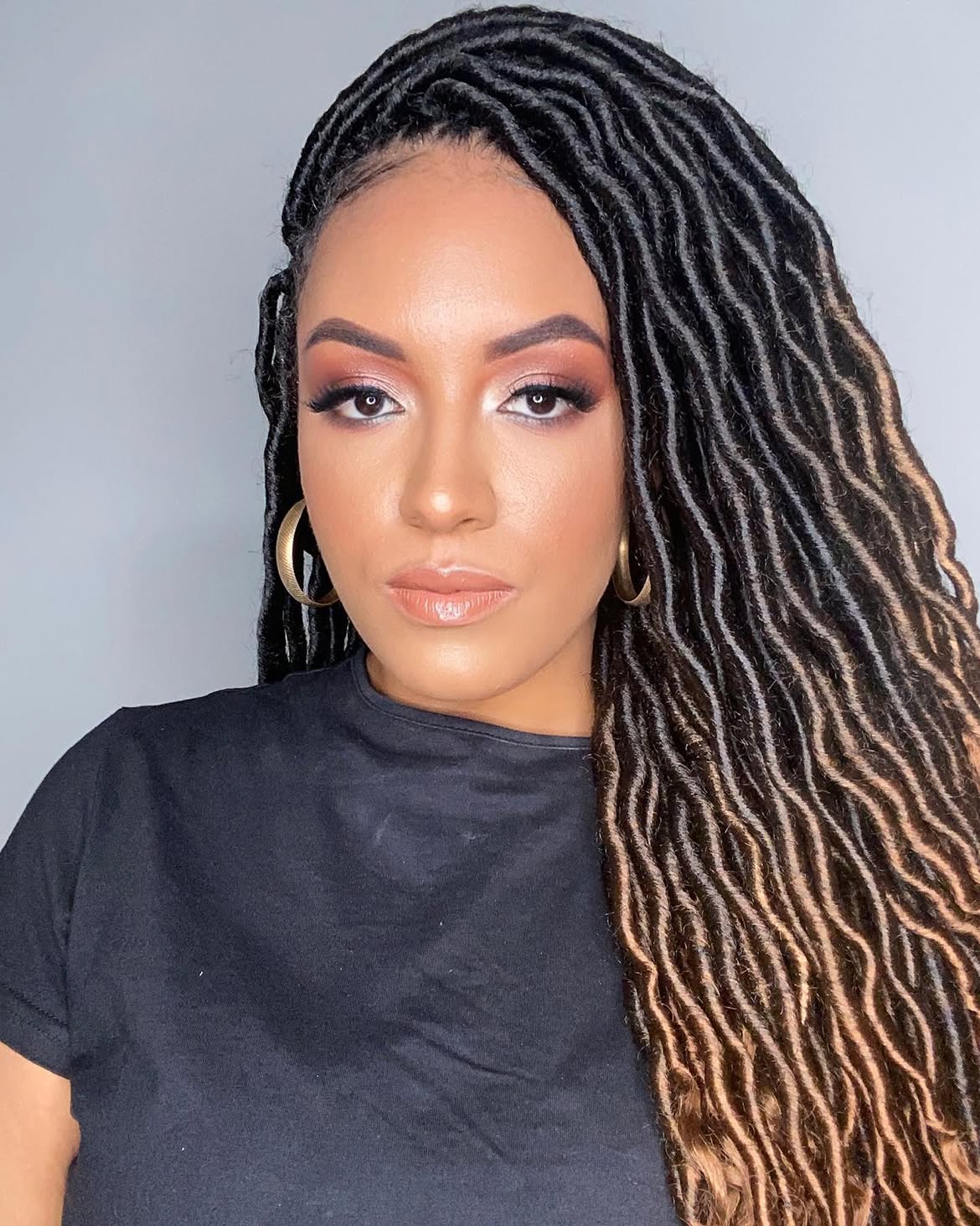 Wavy Faux Locs With Dimensional Honey Highlights