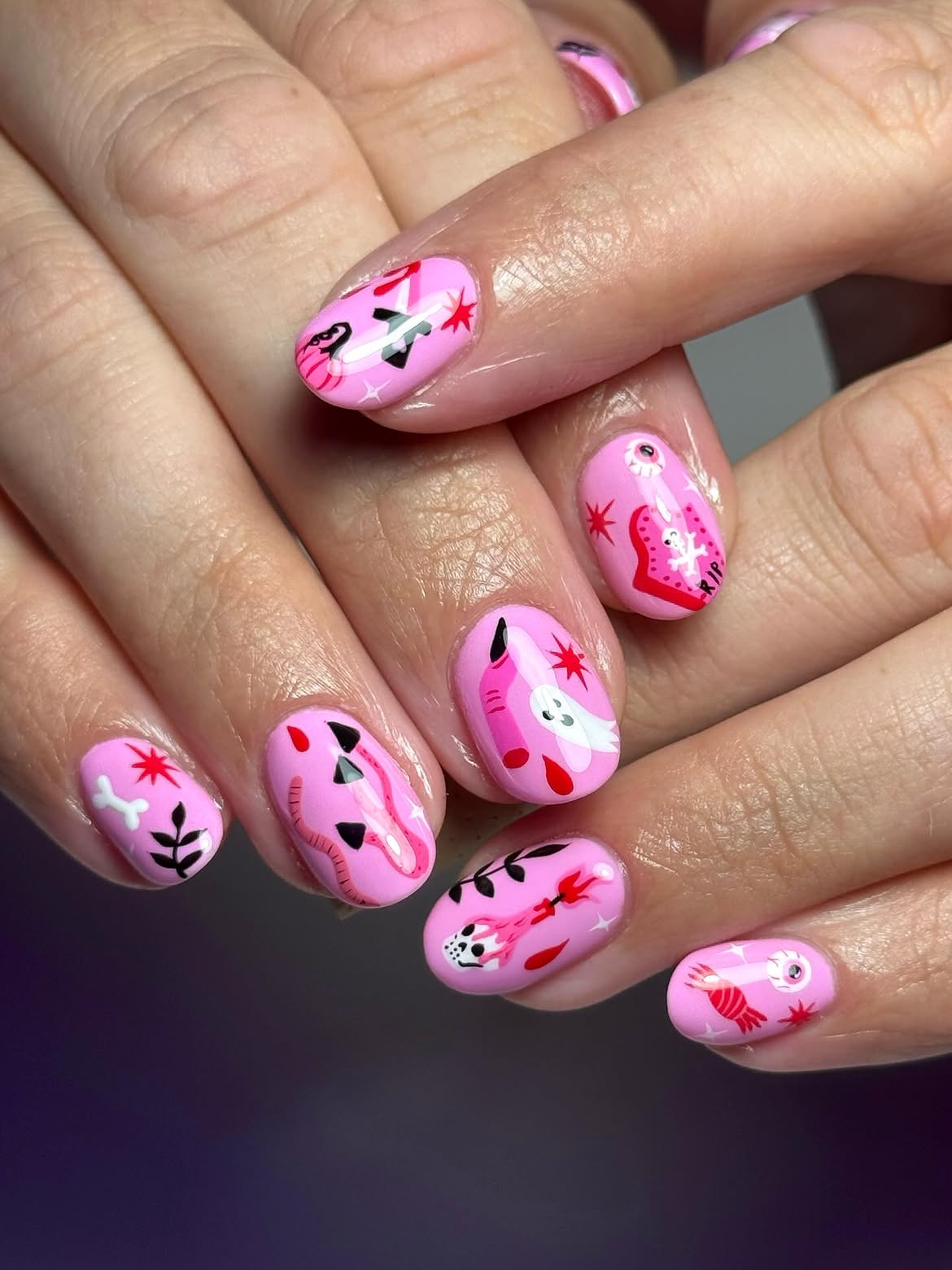Whimsical Pink Halloween Character Nail Art