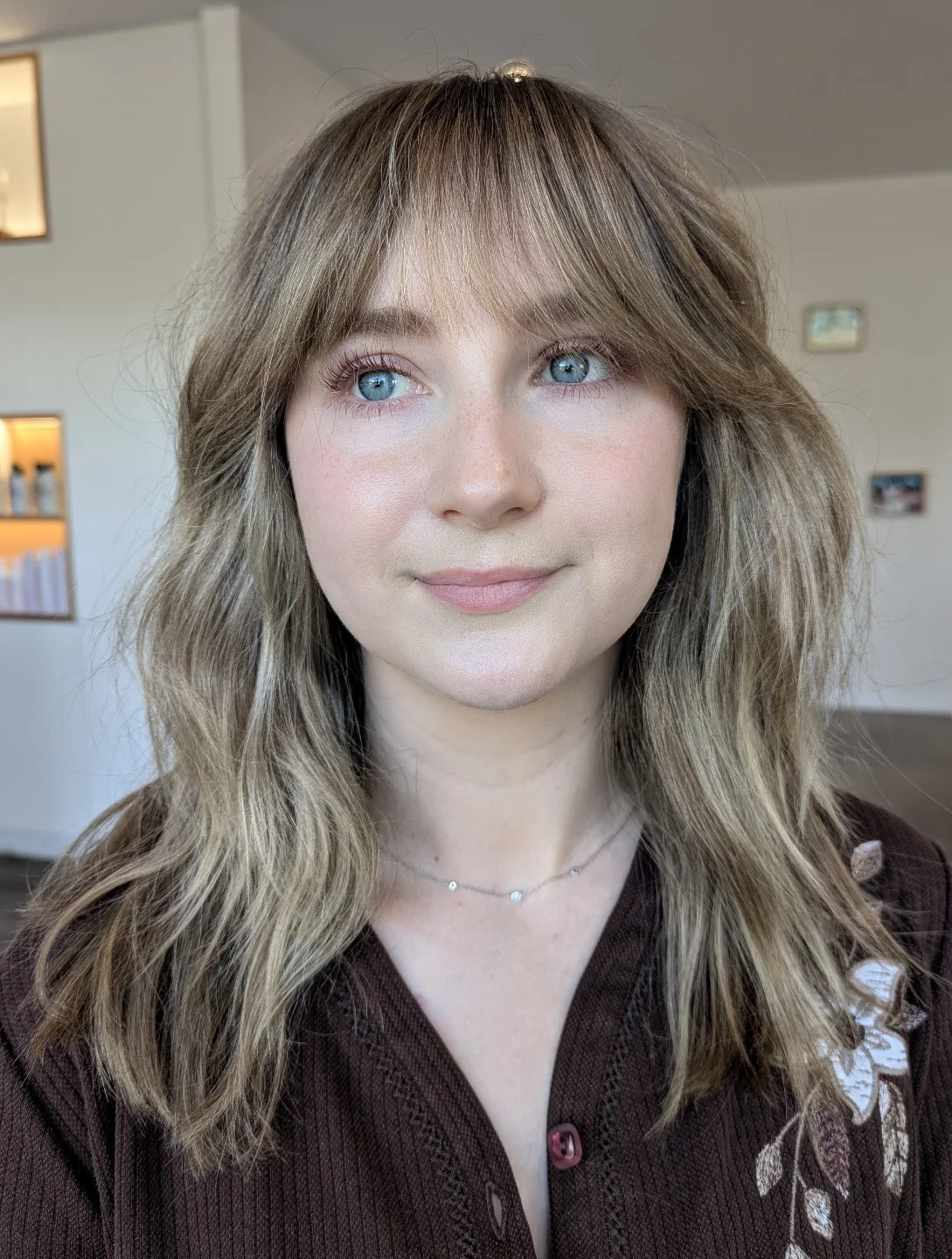 Wispy Curtain Bangs On Textured Ash Blonde Layers