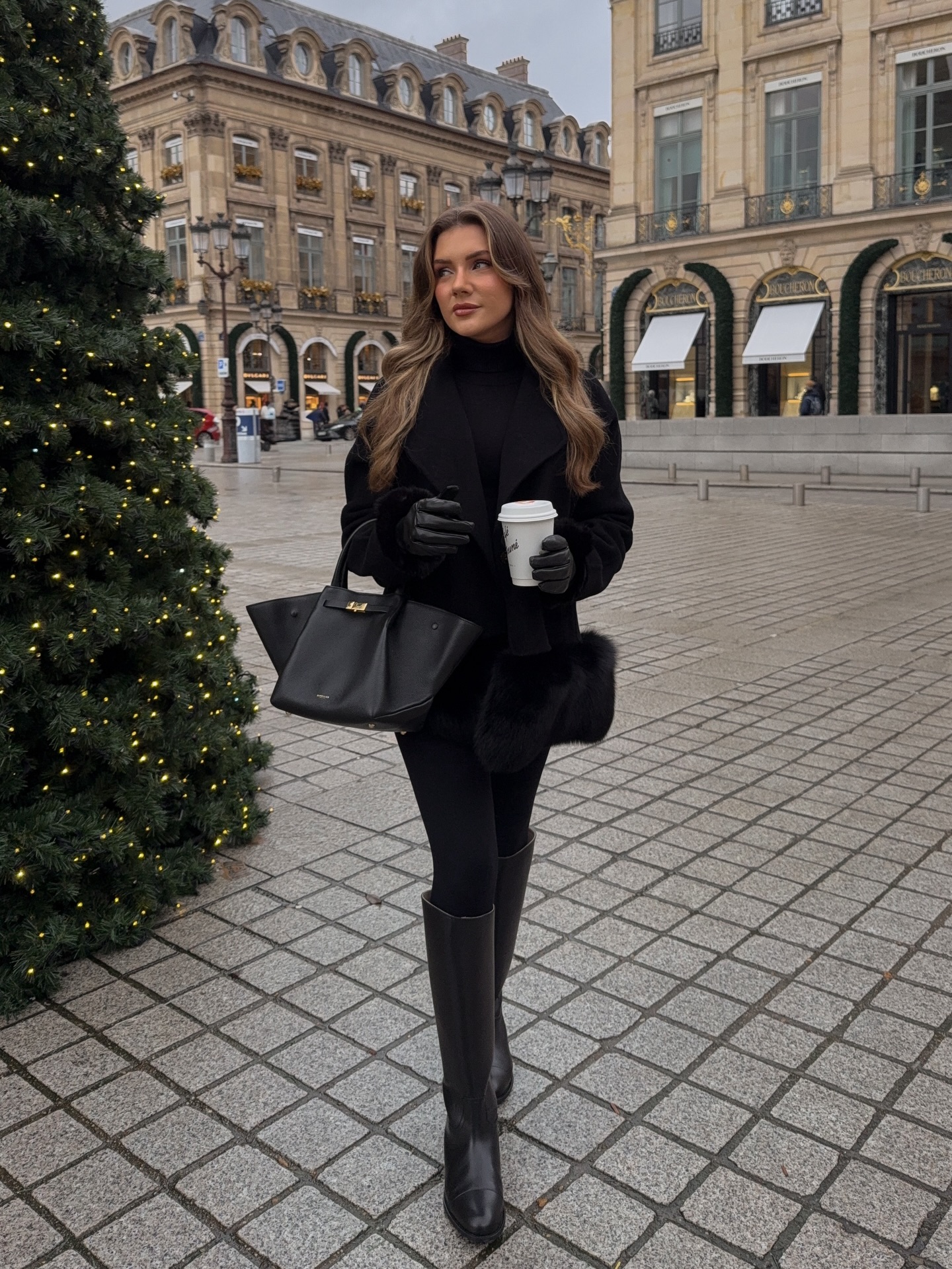 All Black Winter Coat And Knee High Boots Outfit