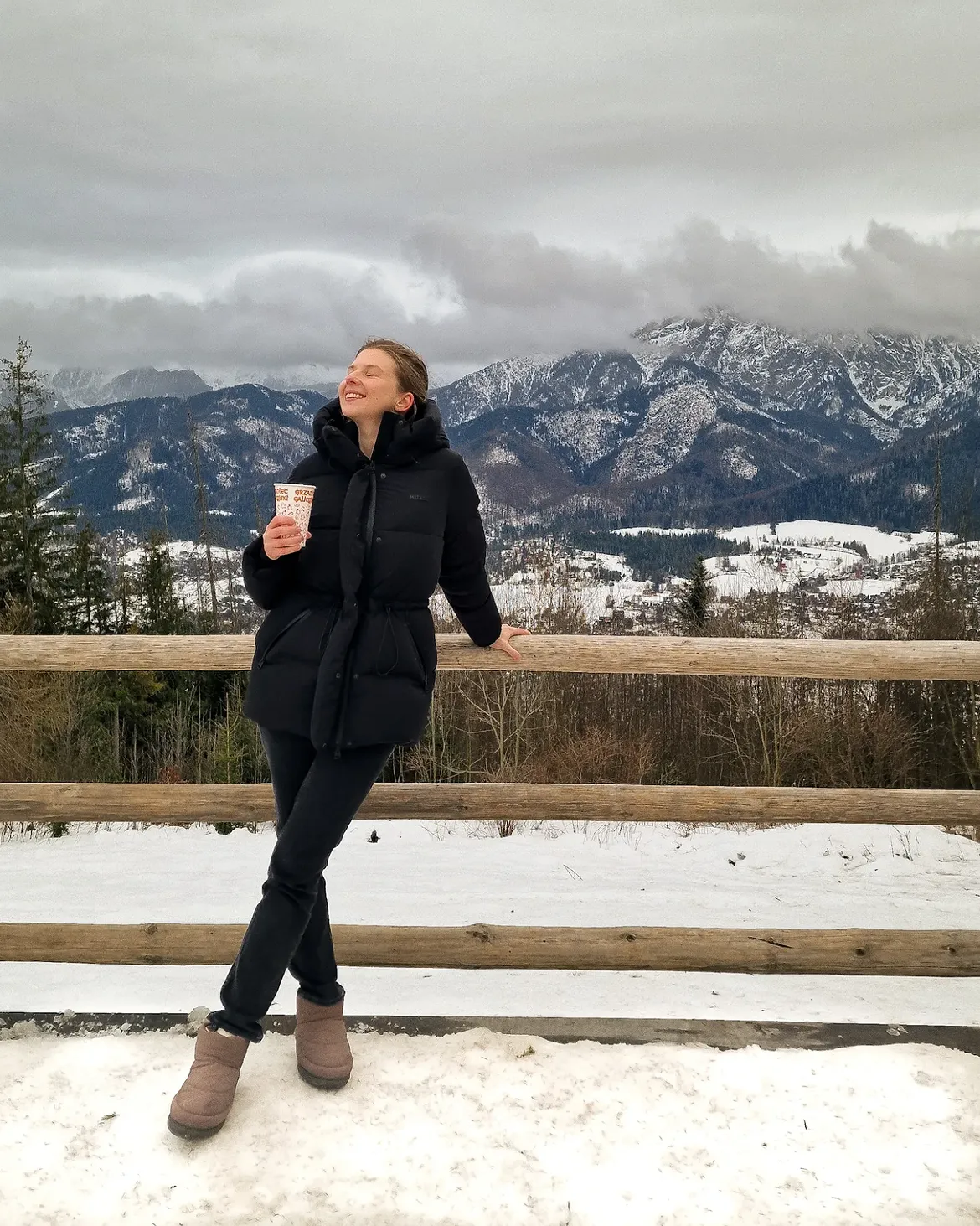 Black Puffer Jacket And Winter Mountain Outfit