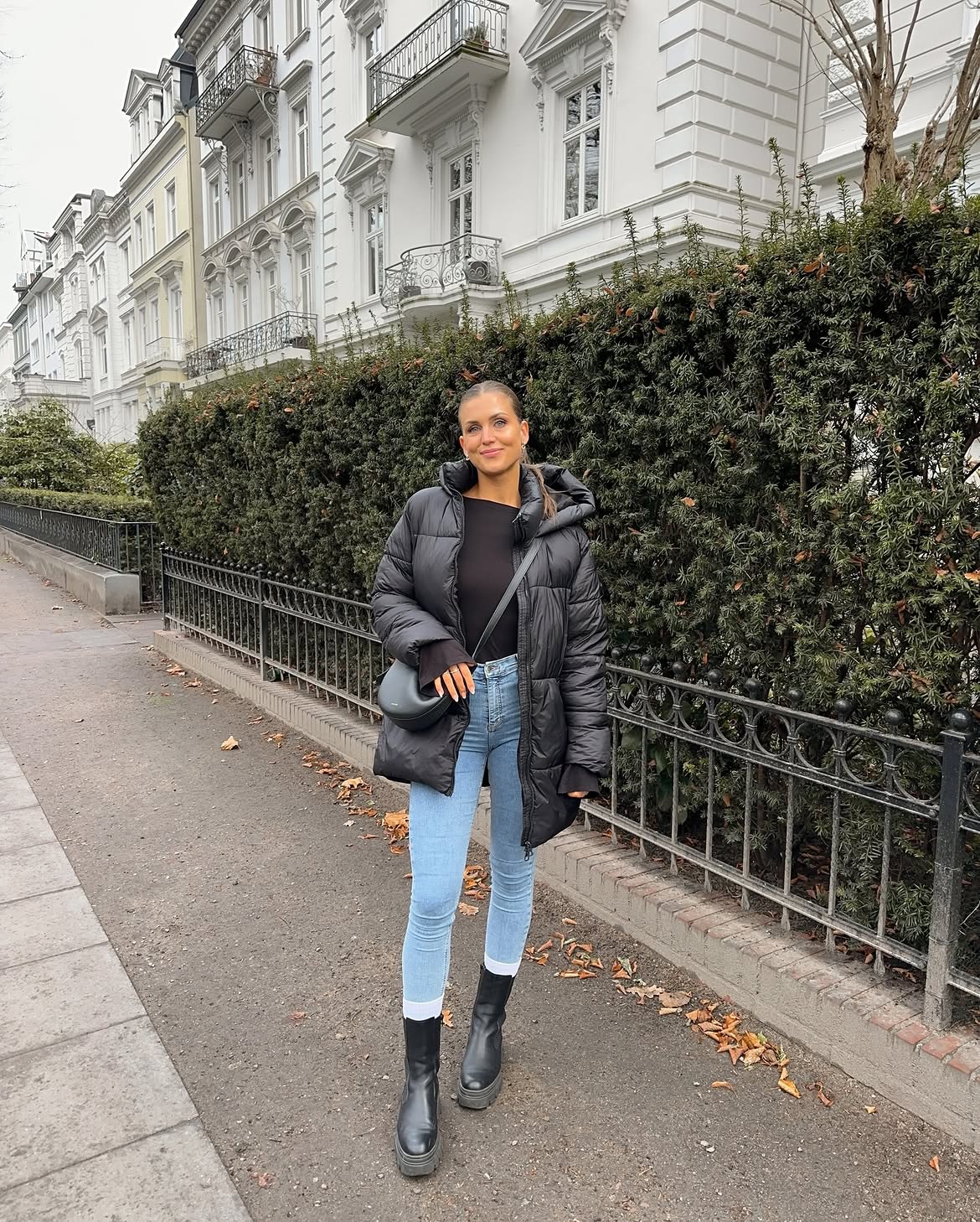 Black Puffer Jacket With Light Wash Skinny Jeans