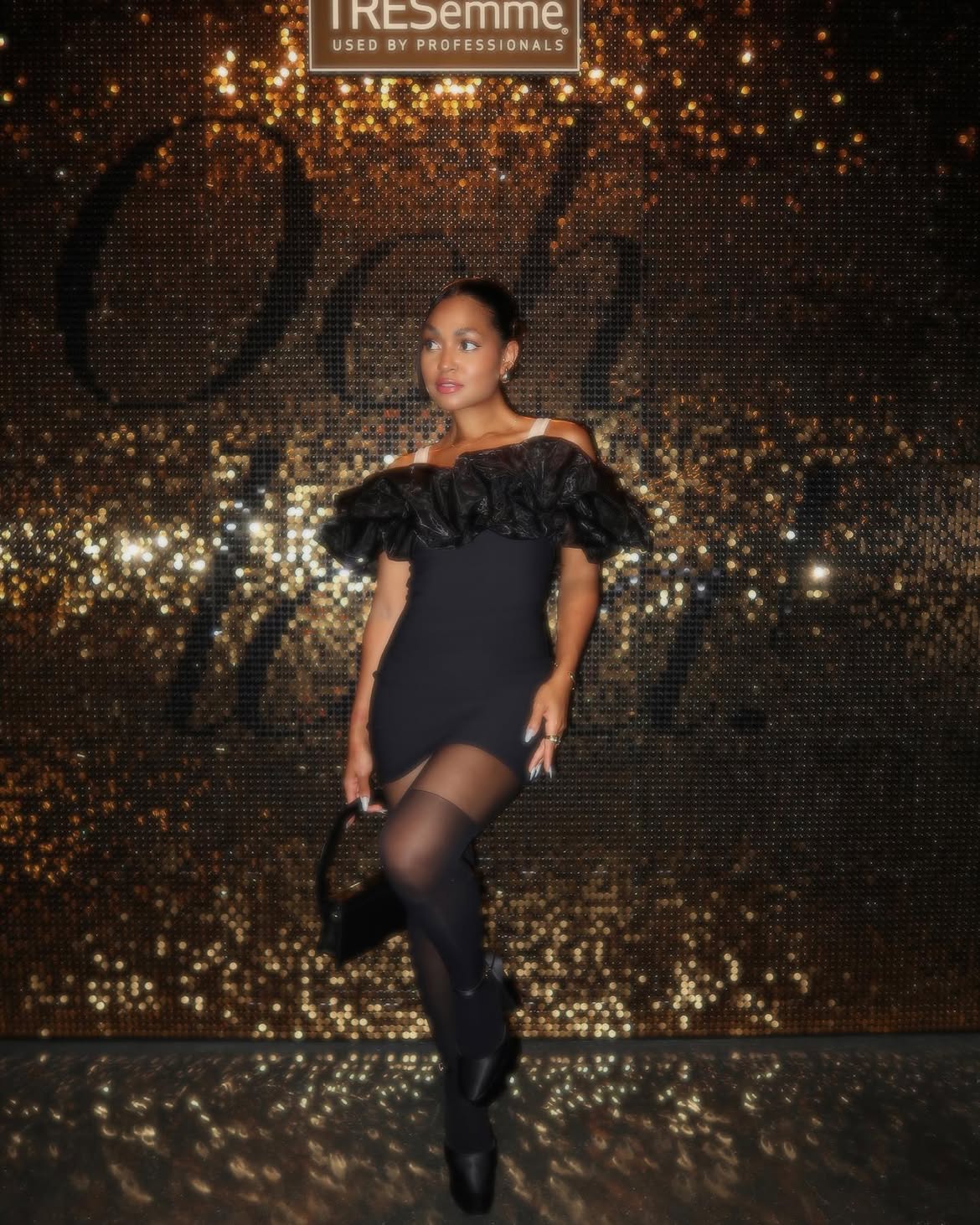 Black Ruffled Mini Dress With Sheer Tights