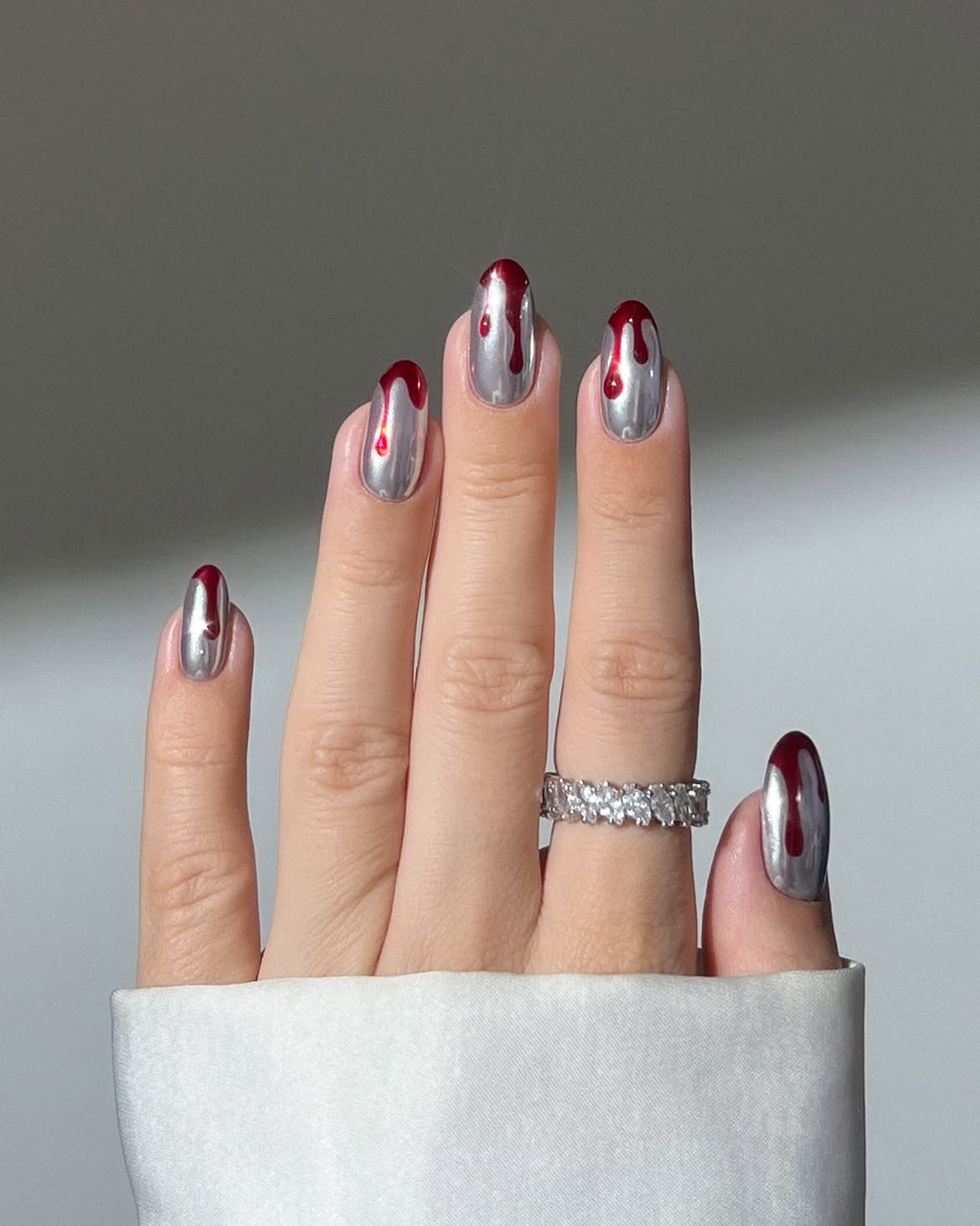 Bloody Silver Chrome Almond Nails