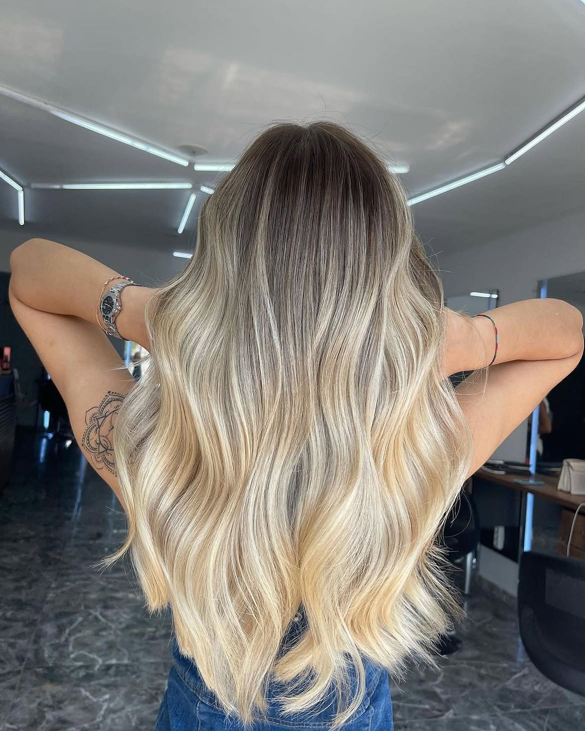Bright Platinum Ombre On Dark Rooted Mid Back Hair