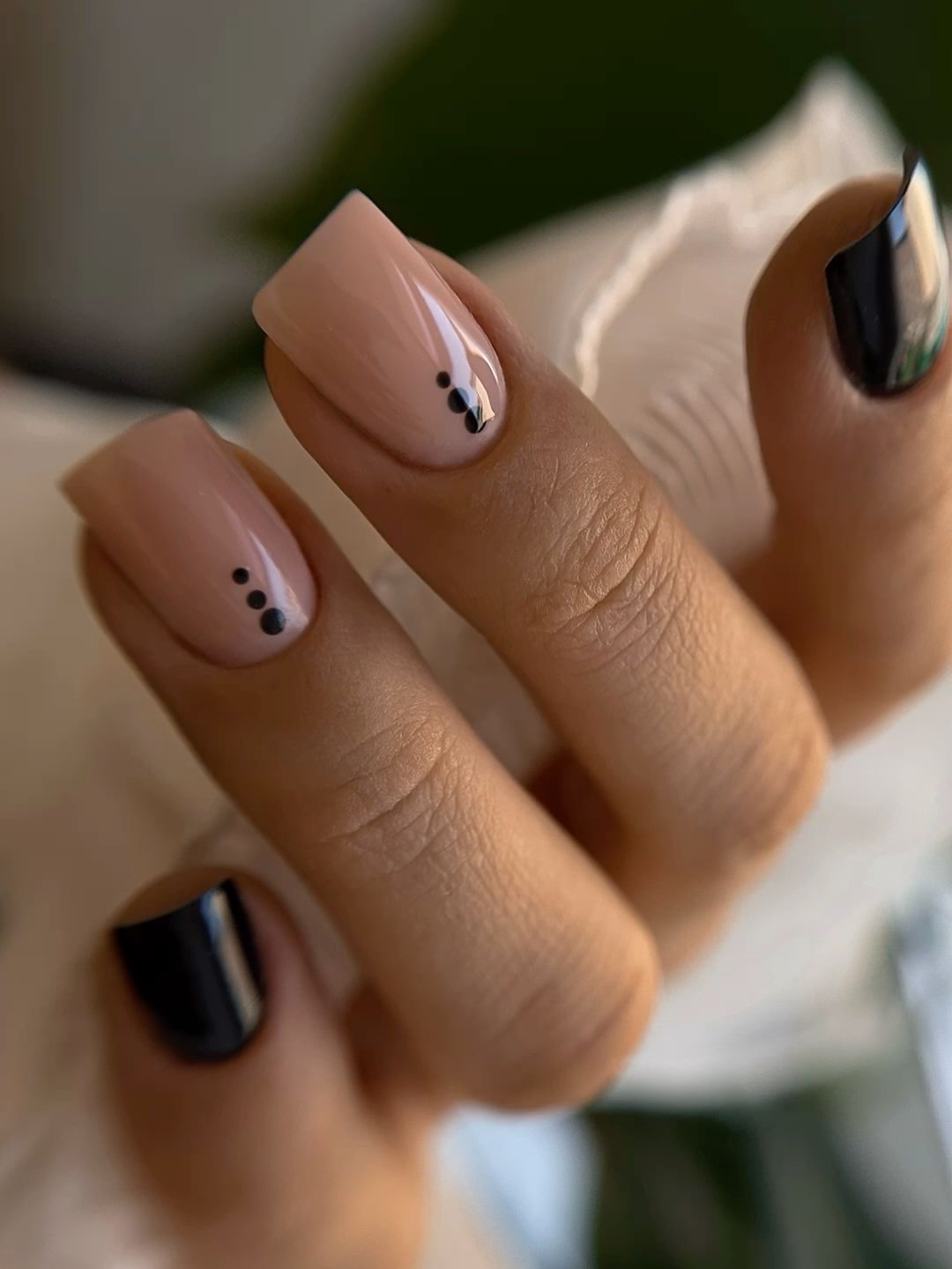 Chic Nude and Black Accent Dot Nails