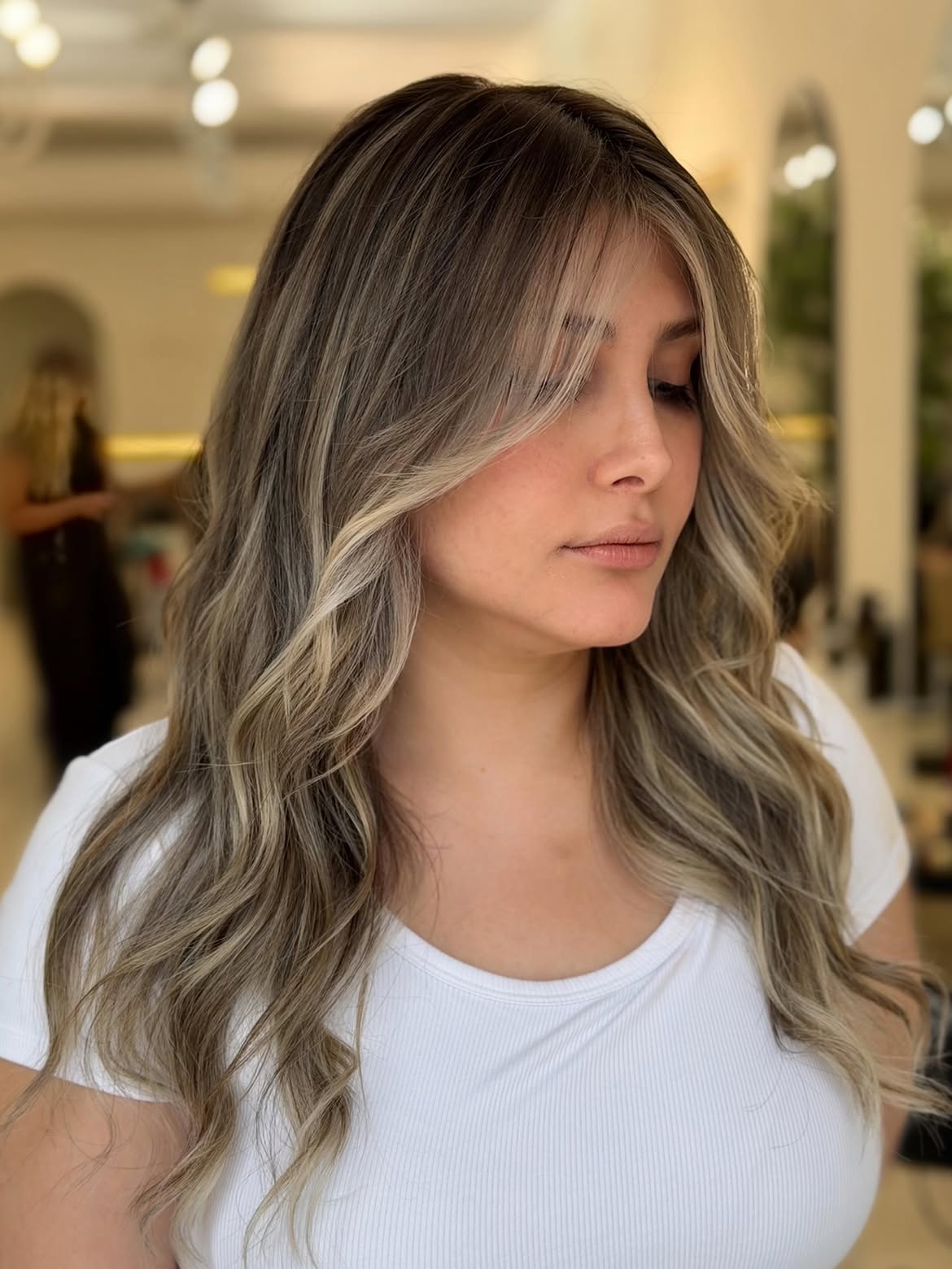 Cool Toned Balayage With Face Framing Curtain Bangs