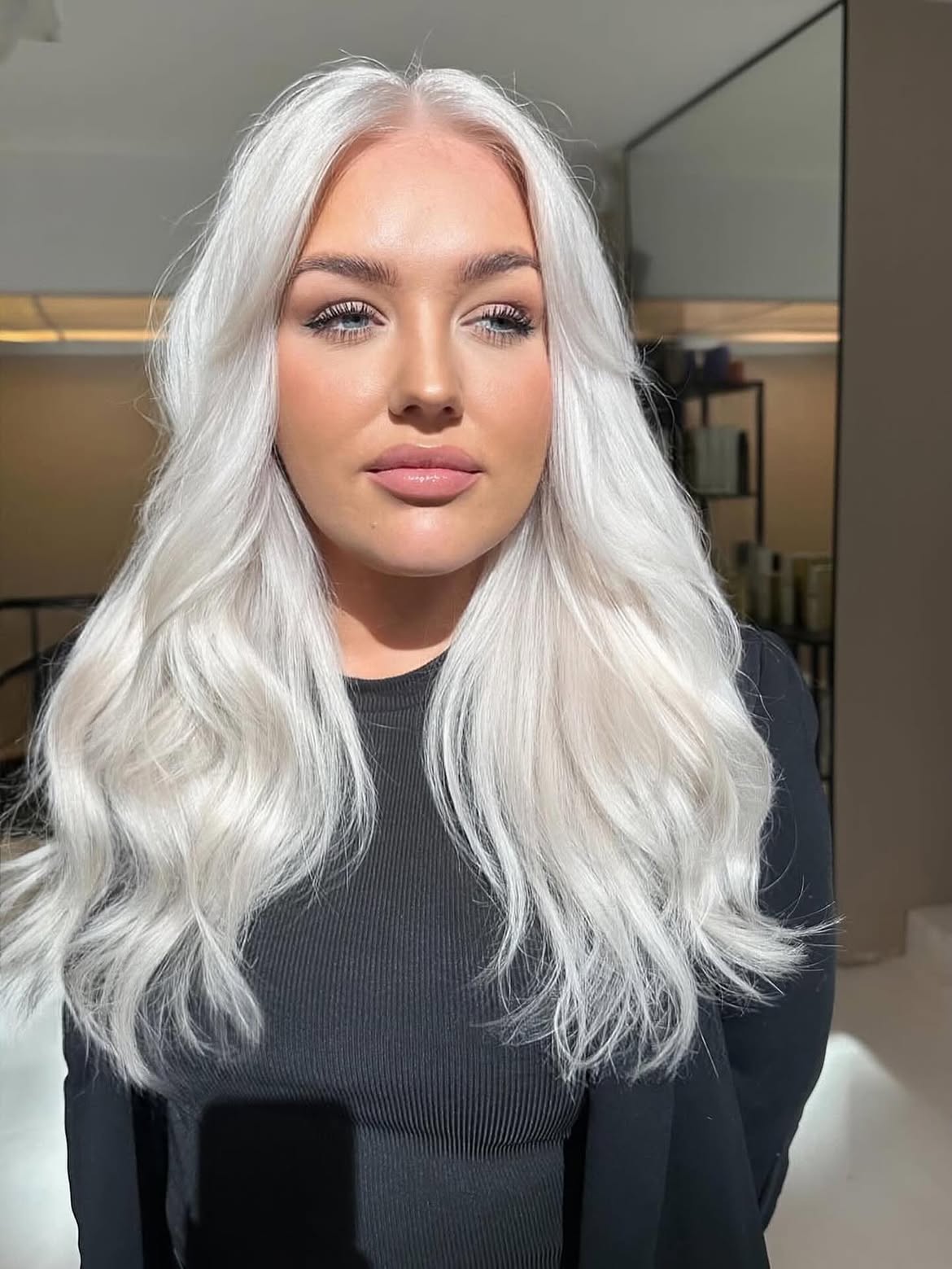 Cool Toned Platinum Blonde With Soft Face Framing Layers