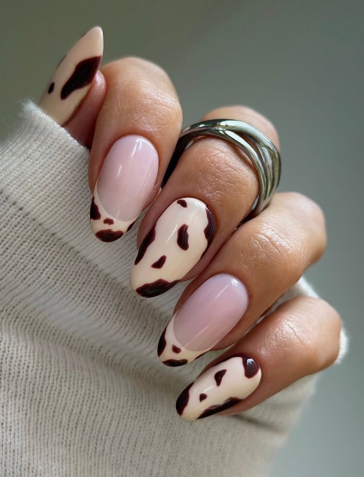 Cow Print French Tip Almond Nails