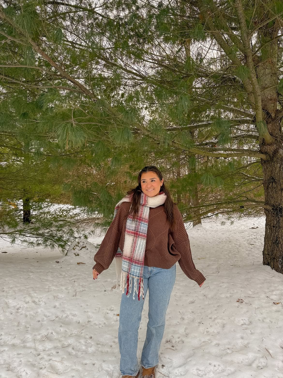 Cozy Brown Knit With Light Wash Jeans And Plaid Scarf